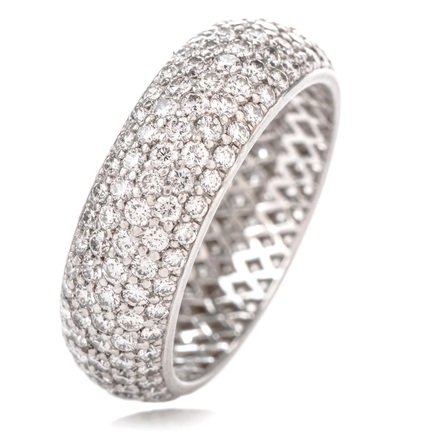 This classic style Diamond domed eternity wedding band is crafted in platinum weighing approximately 9.5 grams and measures

approximately 6mm wide.  The diamonds weigh approximately 2.50 carats and are G-H Color and VS1-VS2 clarity.
Ring Size: