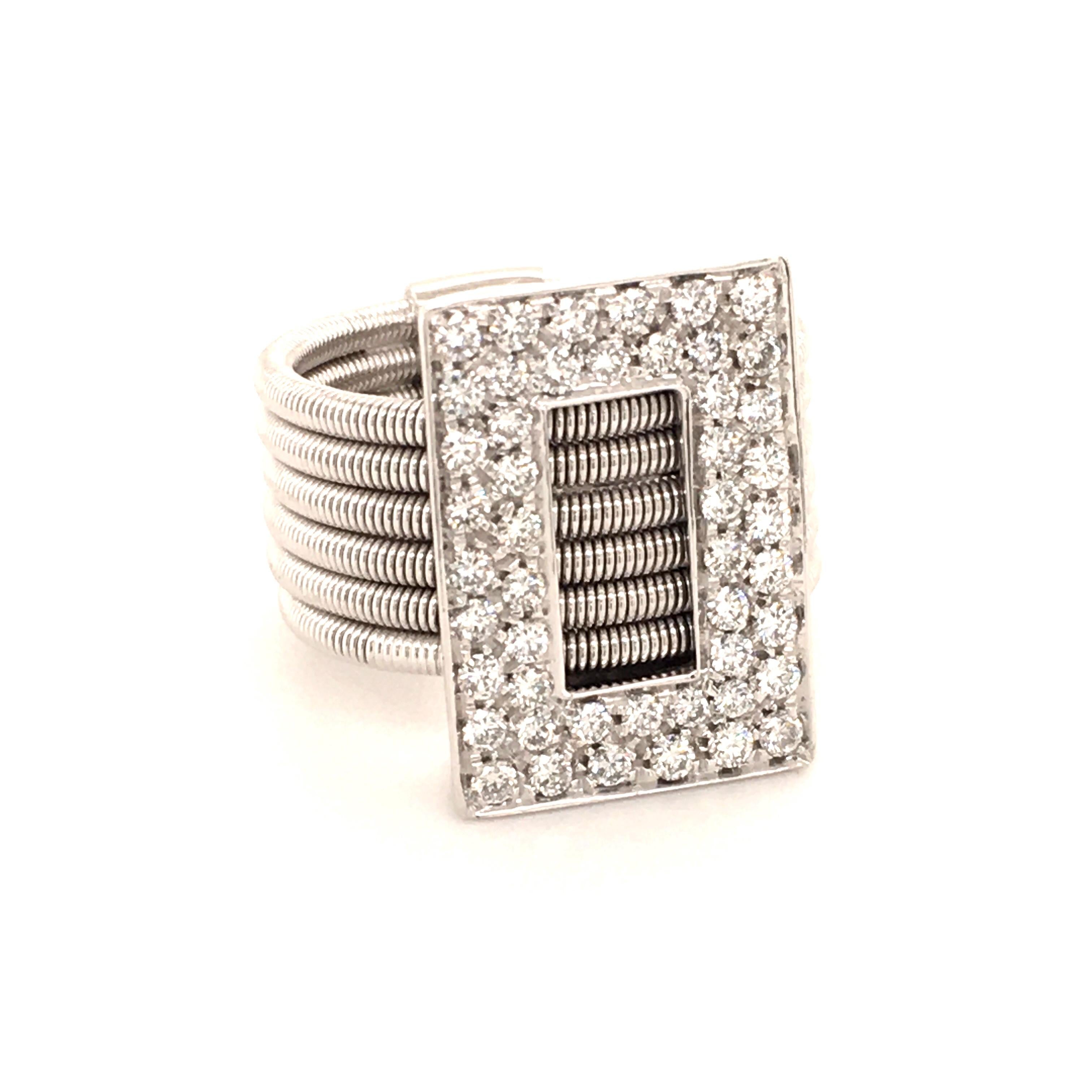 Modern diamond ring in 18 Karat white gold. The ring is designed as a rectangular frame pavé set with 48 brilliant-cut diamonds totalling 0.96 ct of weight. The ring band is consisting of six white gold wires which gives the ring an ultra-modern