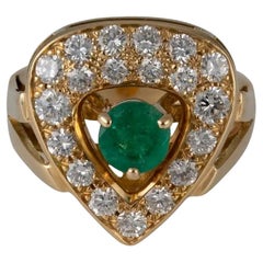 Modern Diamonds and Emerald Gold Ring