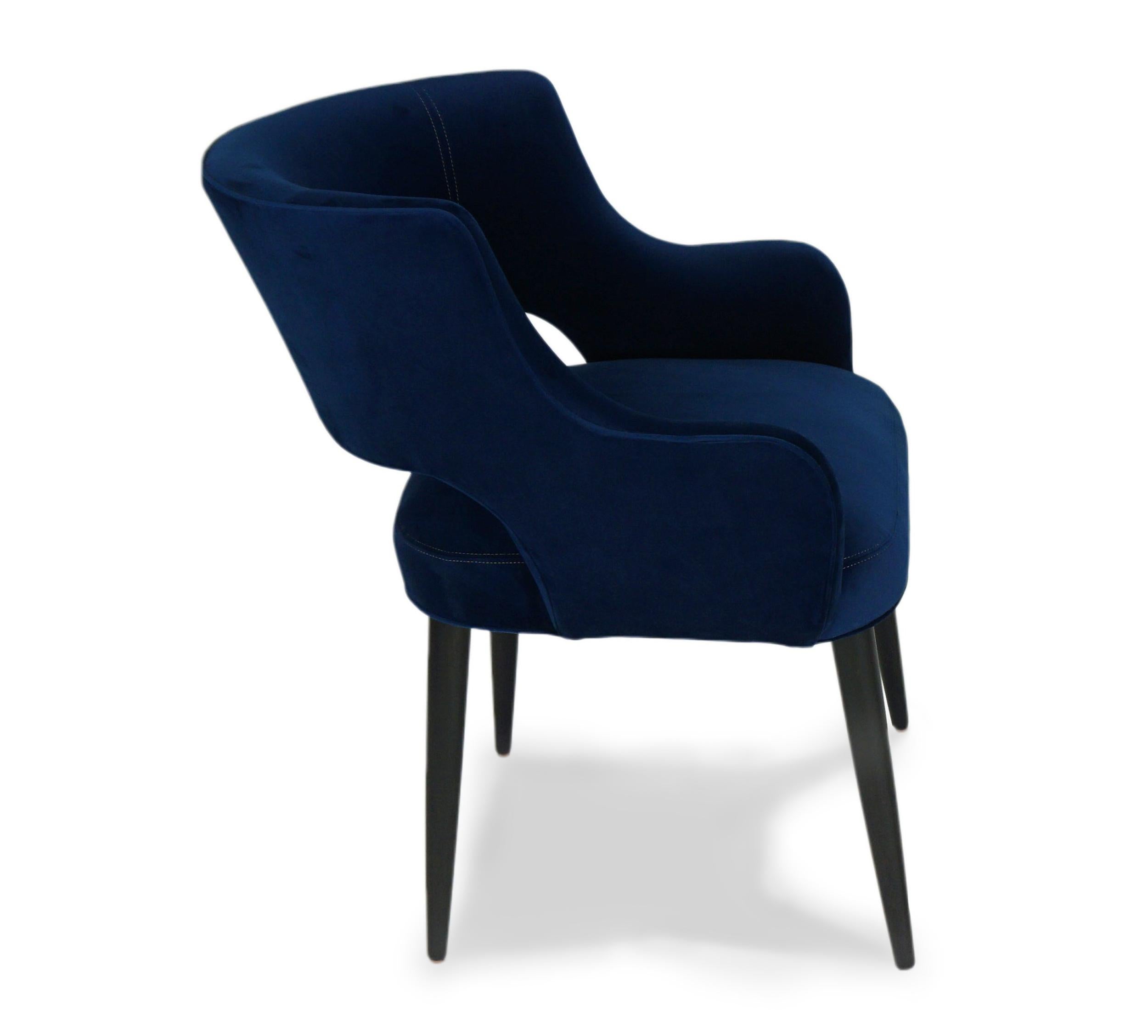 Velvet Modern Dining Chair with Sloping Arms and Relaxed Pitch For Sale