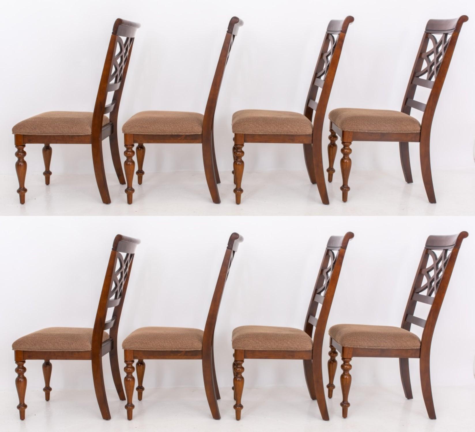 Set of modern dining chairs, eight (8) with reticulated trelliswork backs and upholstered seats on turned legs.

40.5 inches in height, 19 inches in width, 19 inches in depth, with an 18-inch seat.