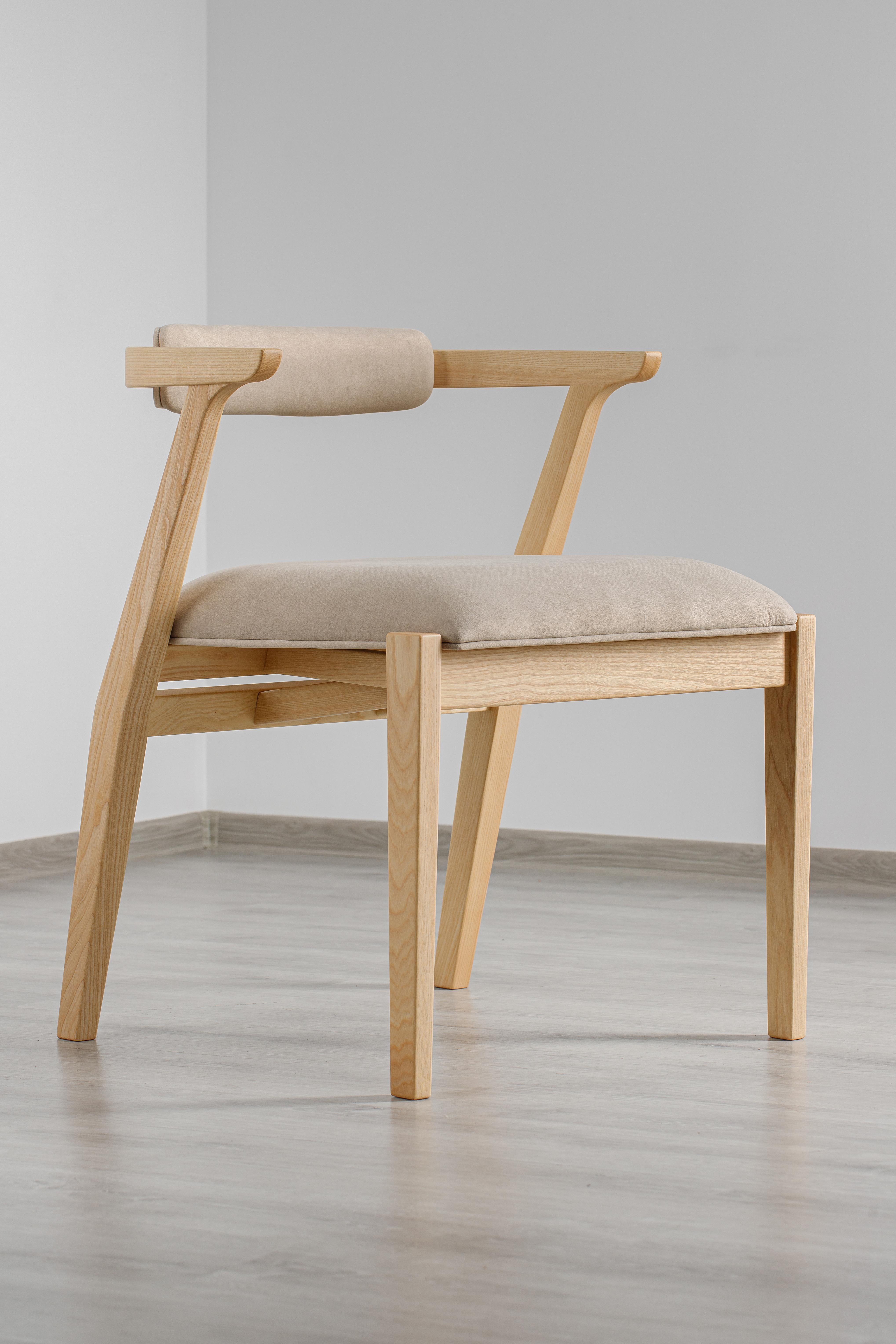 Looking to fit your Ellis Table with the perfect chair? The Ellis Chair provides ultra comfort and exceptional modernity to any space. With multiple tones of colors and a wide angled cushion, the Ellis Chair is a beautiful piece that cannot be