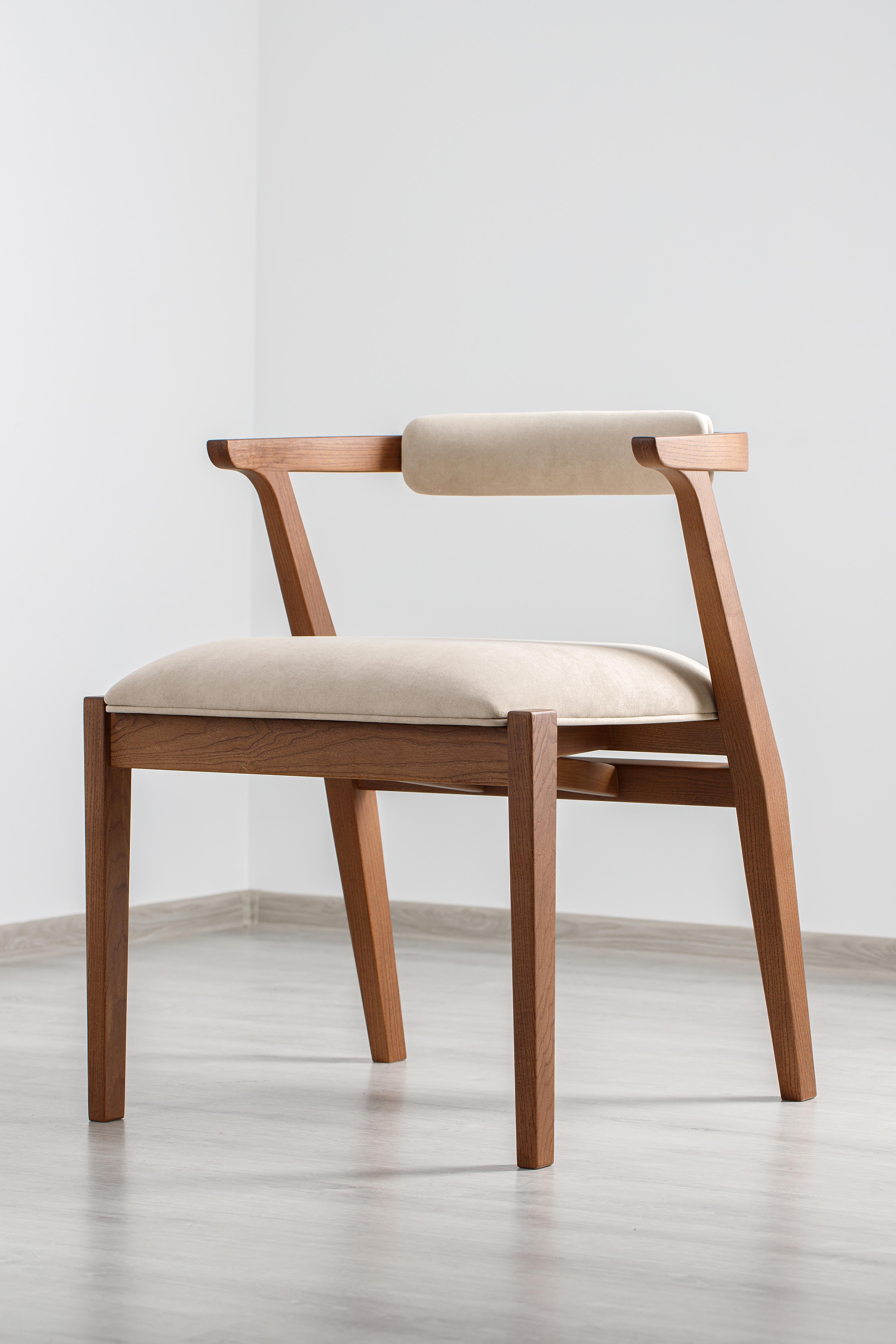 Looking to fit your Ellis Table with the perfect chair? The Ellis Chair provides ultra comfort and exceptional modernity to any space. With multiple tones of colors and a wide angled cushion, the Ellis Chair is a beautiful piece that cannot be
