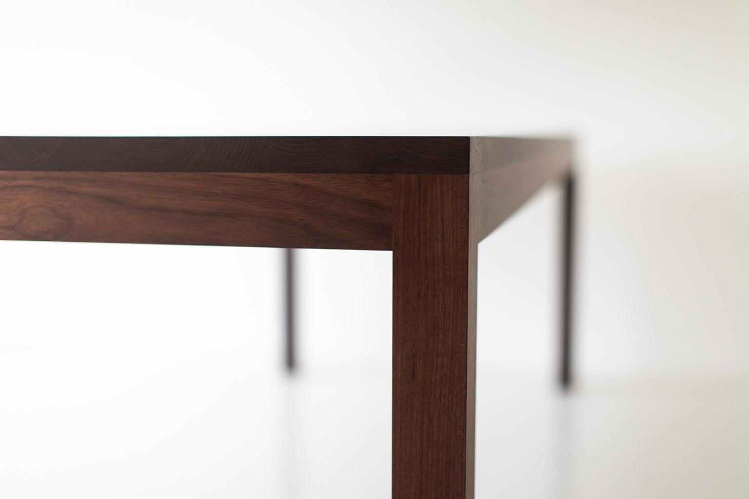 Modern walnut dining table for Bertu Home.

This modern walnut dining table is made in the heart of Ohio with locally sourced wood. We use the table both as a modern dining table or desk. Each table is hand-made with solid walnut and finished with