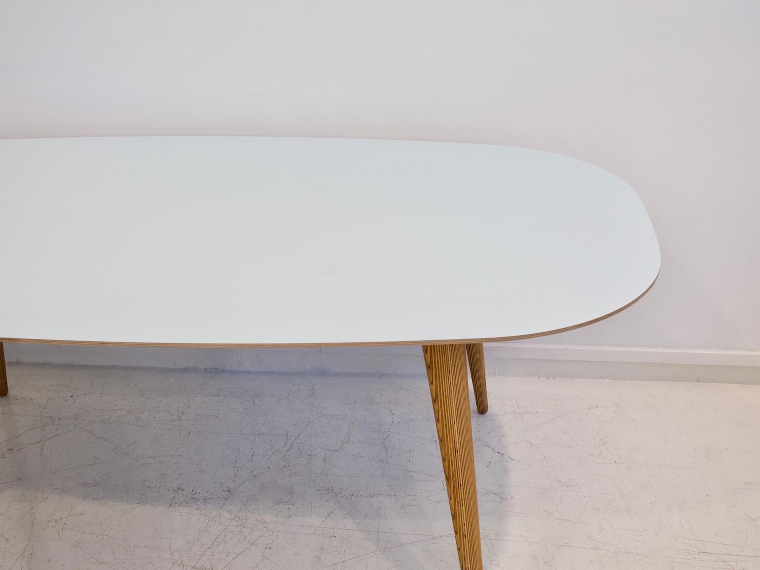 Contemporary Modern Dining Table with Conical Birch Legs and Light Blue Laminate Top For Sale