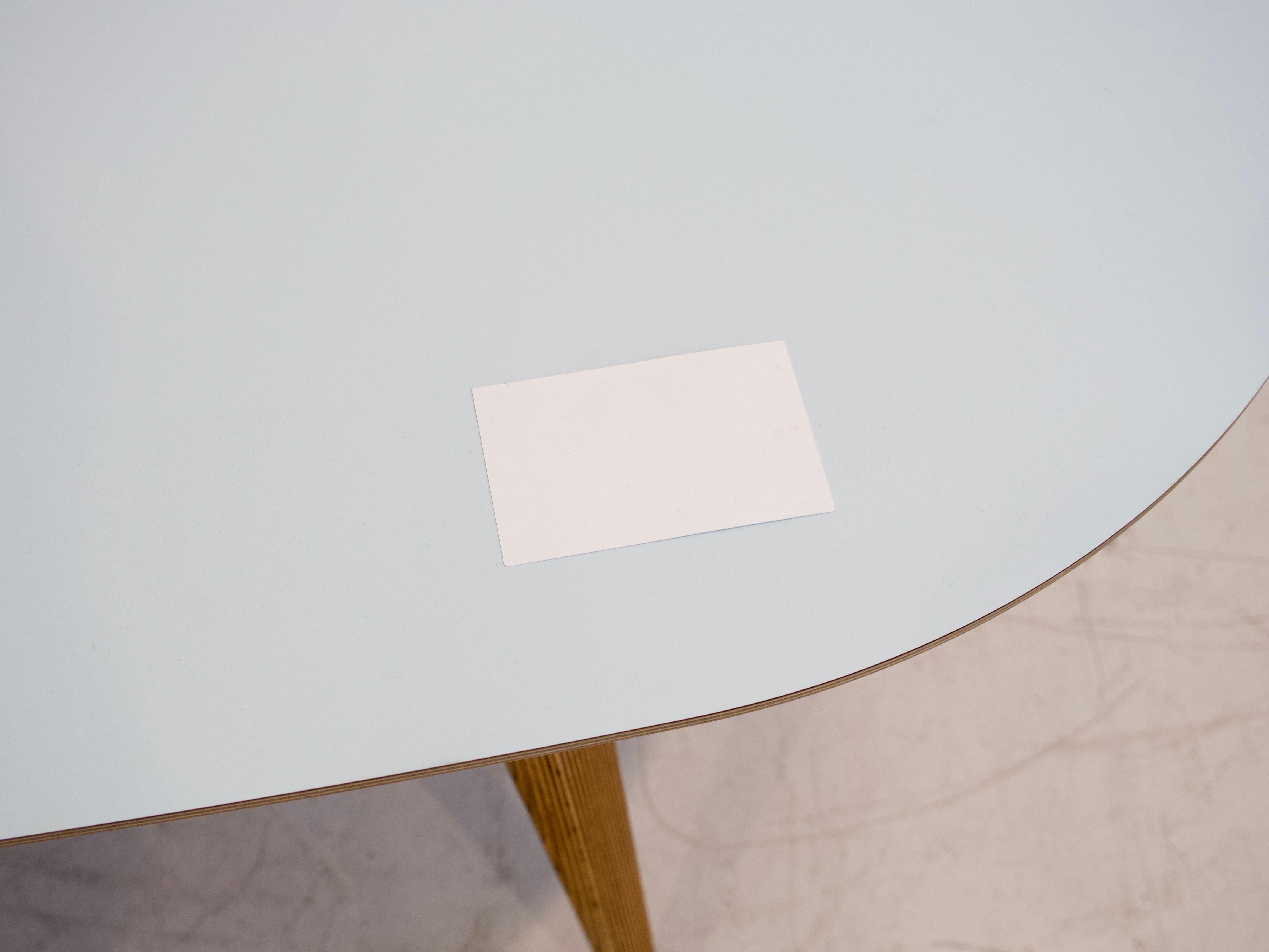 Modern Dining Table with Conical Birch Legs and Light Blue Laminate Top For Sale 1