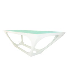 Tavolo da pranzo moderno con piano in vetro verniciato e struttura in laccato bianco