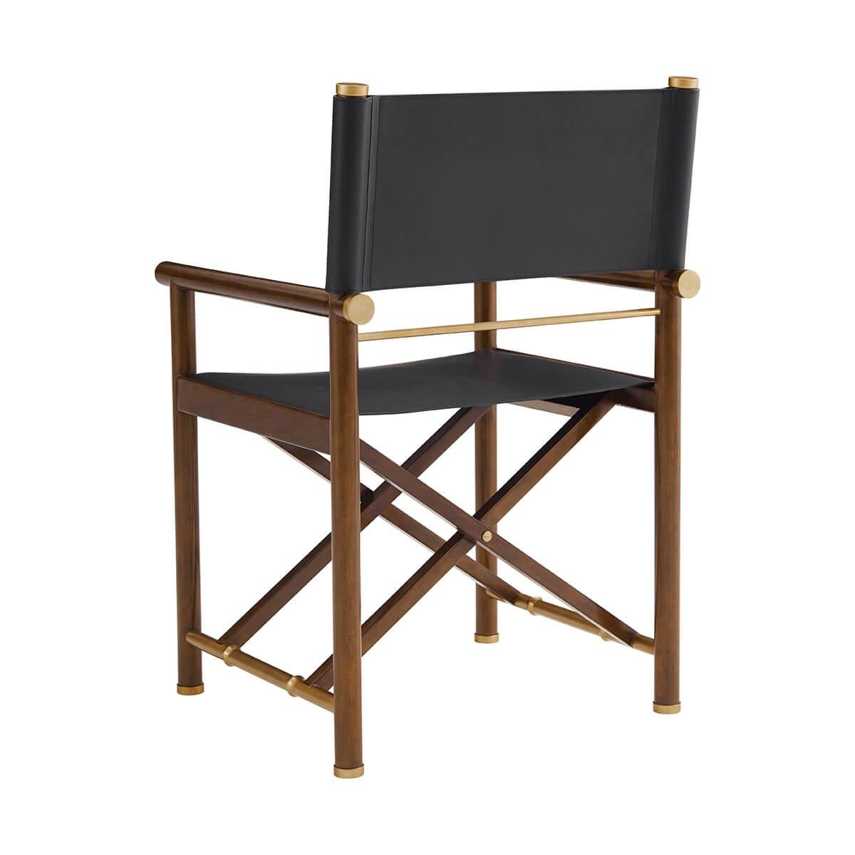 This chair features a sophisticated black leather backrest and seat, paired with a rich wooden beech frame and elegant brass accents for a touch of luxury.

Perfect for those who appreciate timeless style with a modern twist. Ideal for a chic home