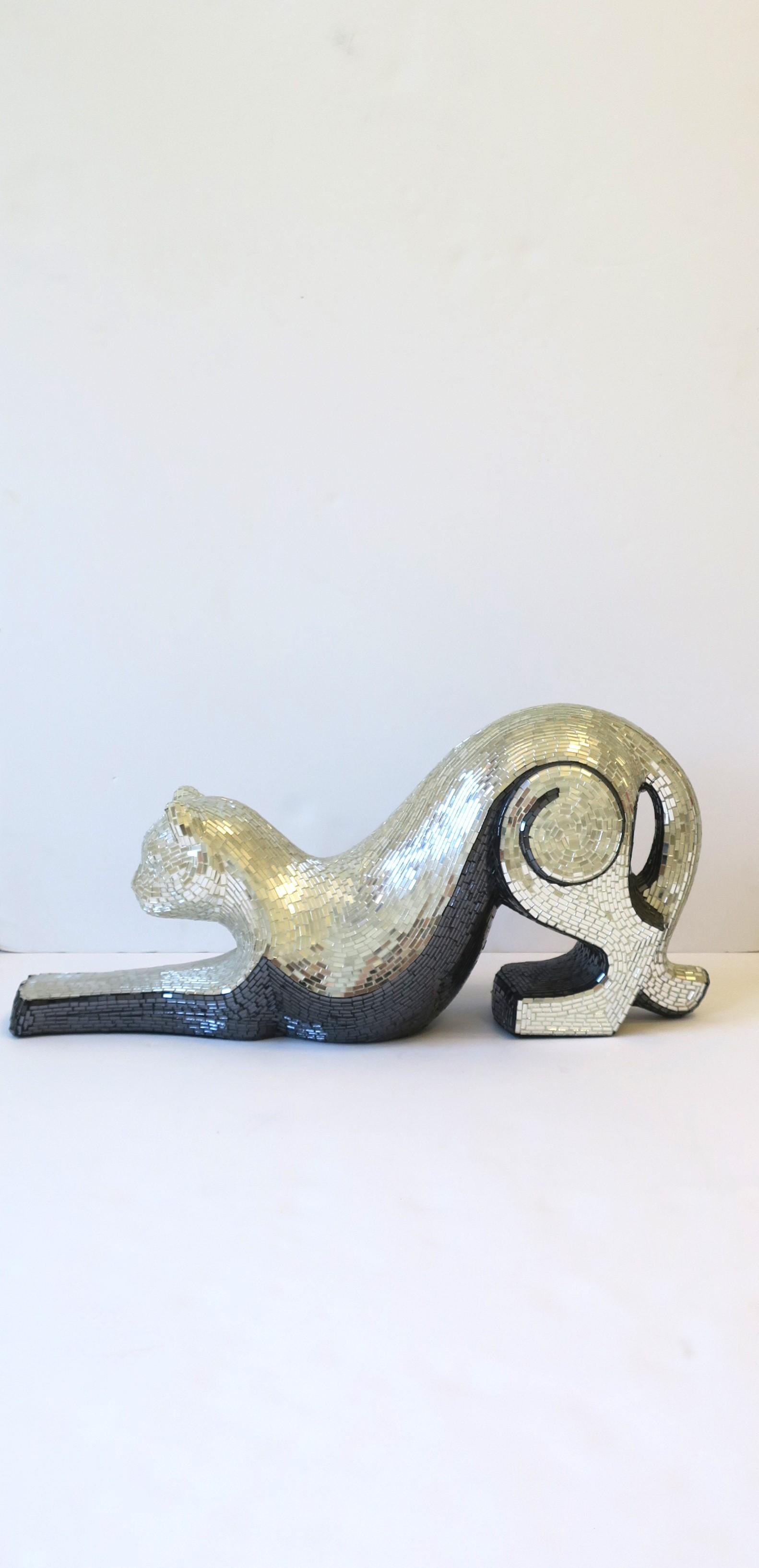Love a disco ball? Here is a chic '70s Modern mirrored disco Panther cat sculpture by Brazilin artist, Jobi, circa late-20th century, 1970s, Brazil. Panther cat is hand-made and covered in silver and black mirrored glass inlaid mosaic pieces. Cat is
