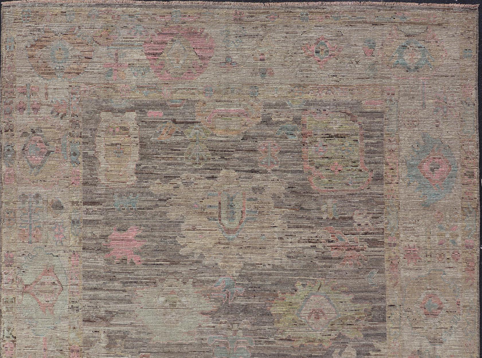 Afghan Modern Distressed Oushak in Large Floral Design on Brown Field and Tan Border For Sale