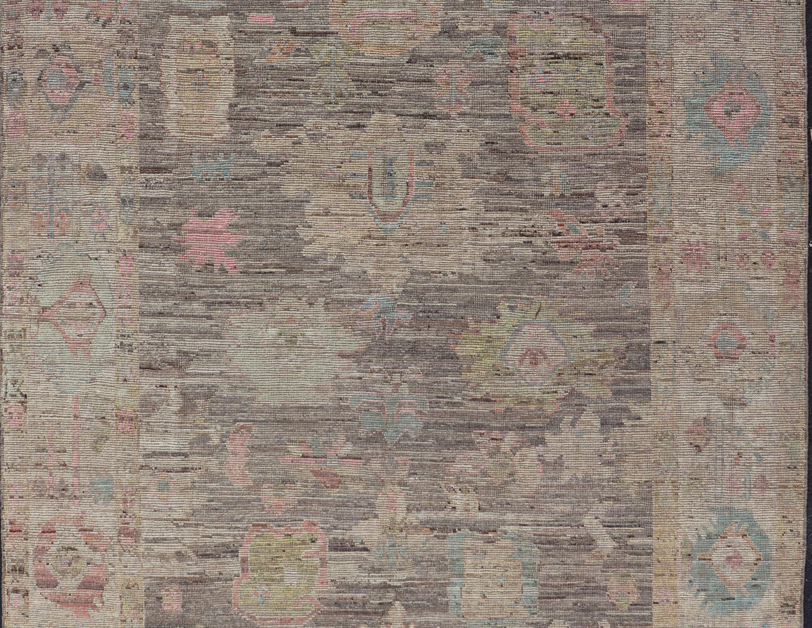 Hand-Knotted Modern Distressed Oushak in Large Floral Design on Brown Field and Tan Border For Sale