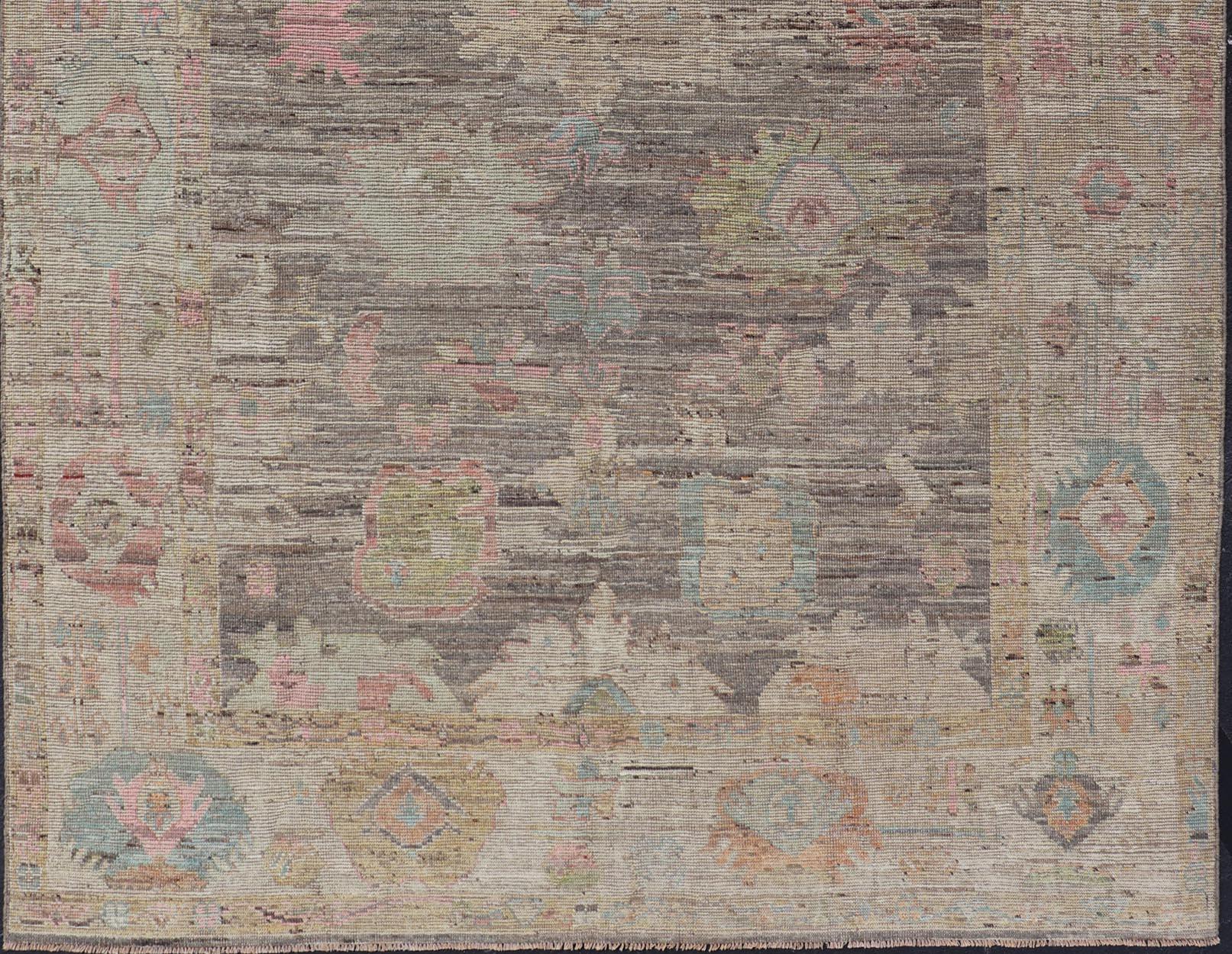 Modern Distressed Oushak in Large Floral Design on Brown Field and Tan Border In New Condition For Sale In Atlanta, GA