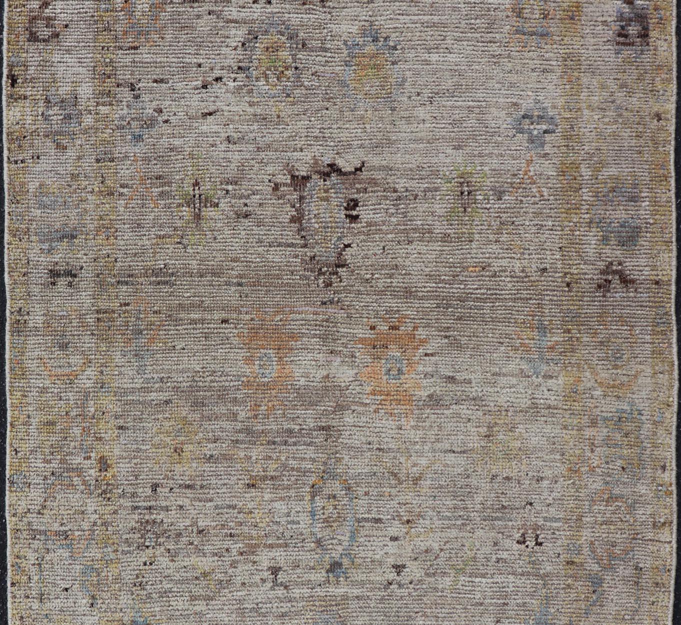 Contemporary Modern Distressed Oushak With All-Over Floral Design on Cream Field and Border  For Sale