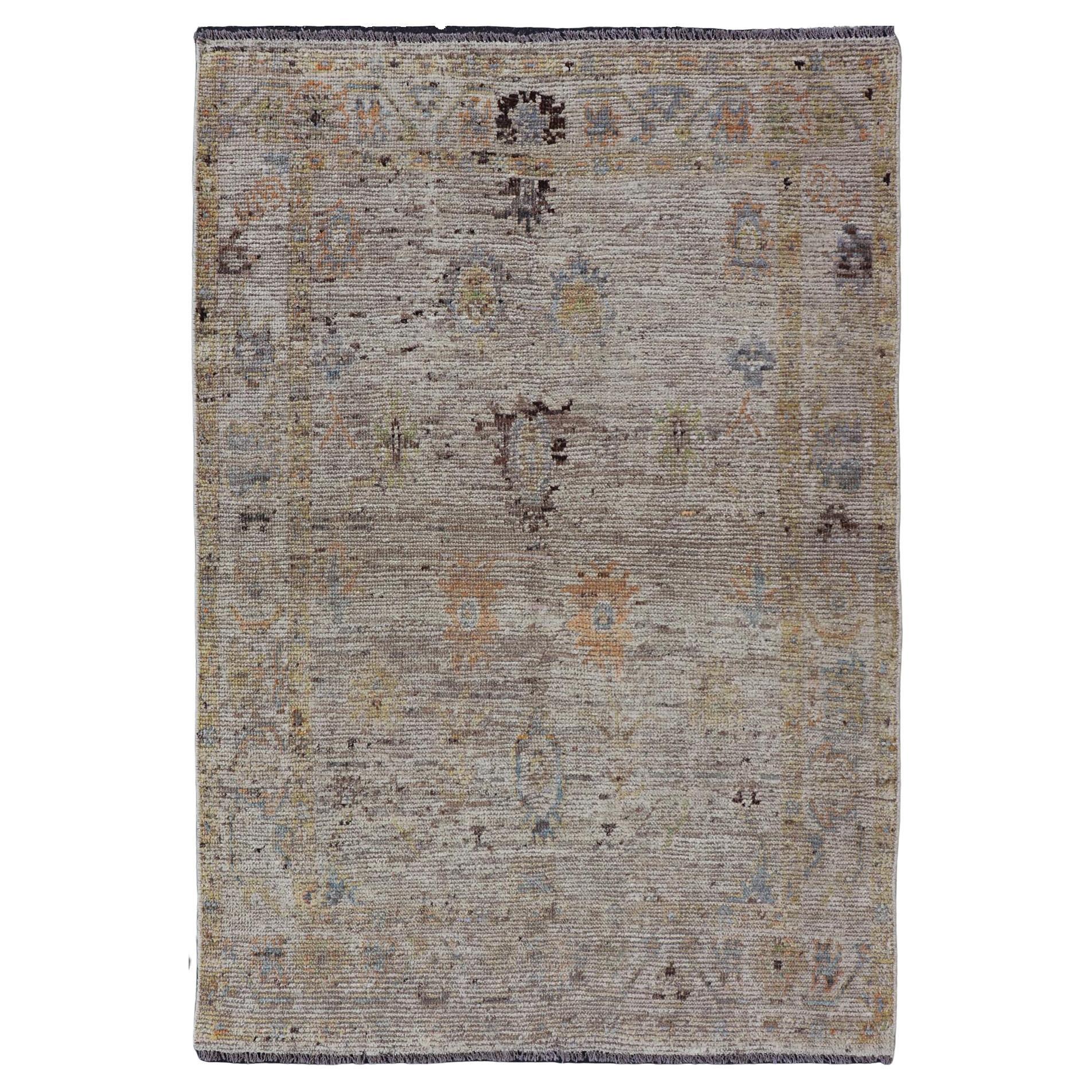 Modern Distressed Oushak With All-Over Floral Design on Cream Field and Border  For Sale