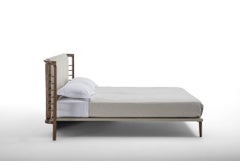 Modern Dolfin bed in Canaletta Walnut and leather