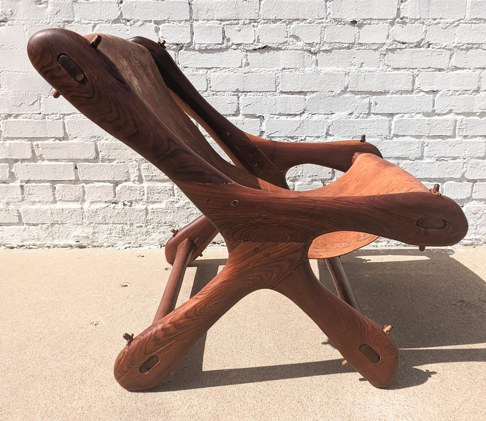 Modern Don Shoemaker Sling Chair for Senal
 
Above average vintage condition and structurally sound. Has some expected slight finish wear and scratching. Has a couple small dings and discolorations. Leather is discolored and has wear and two cuts in