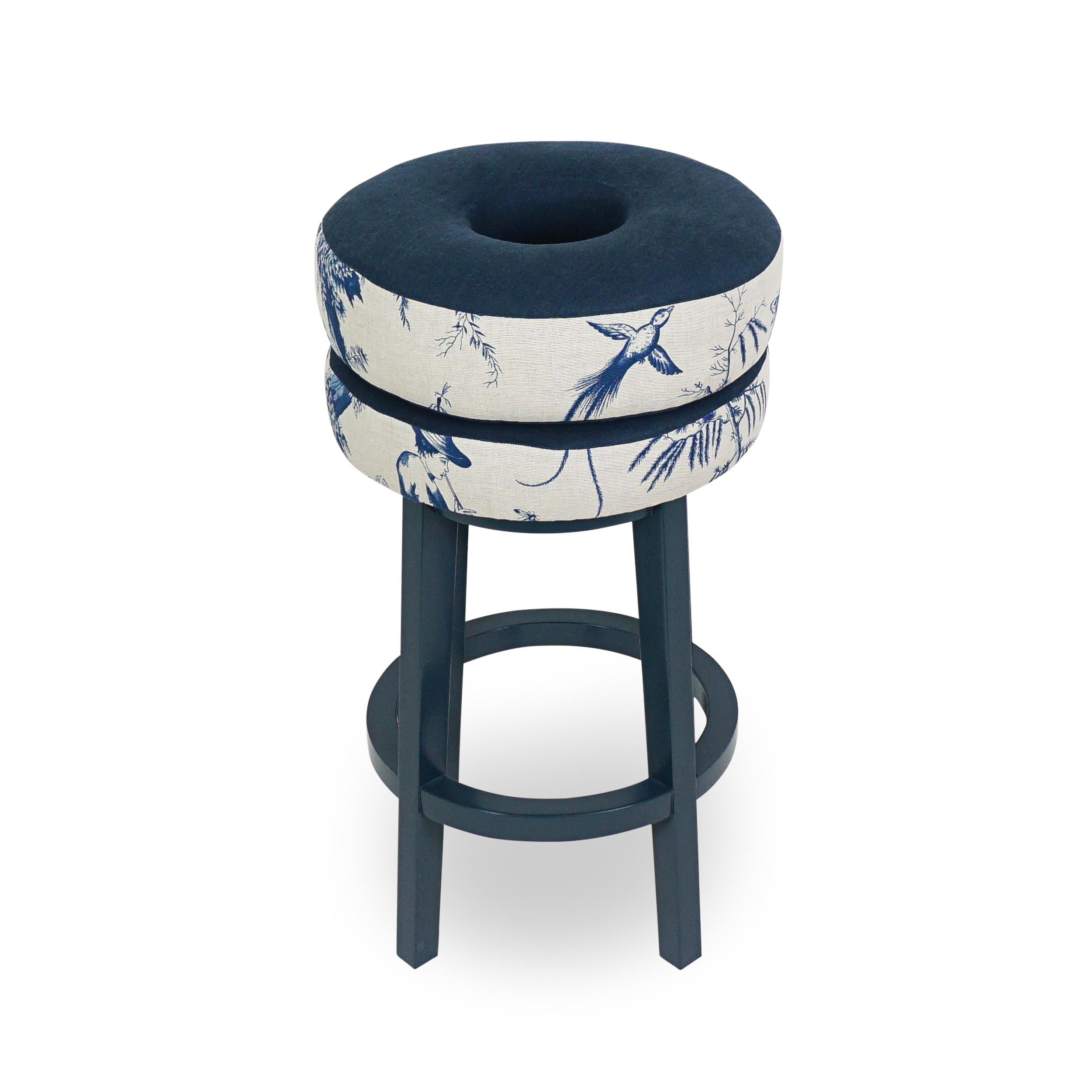 This classic and stunning bar stool design features an ergonomically shaped comfortable double cushion, donut shaped seat with durable navy fabric on top and historically inspired Japanese Shengyou Toile by Schumacher on the sides. The hard maple