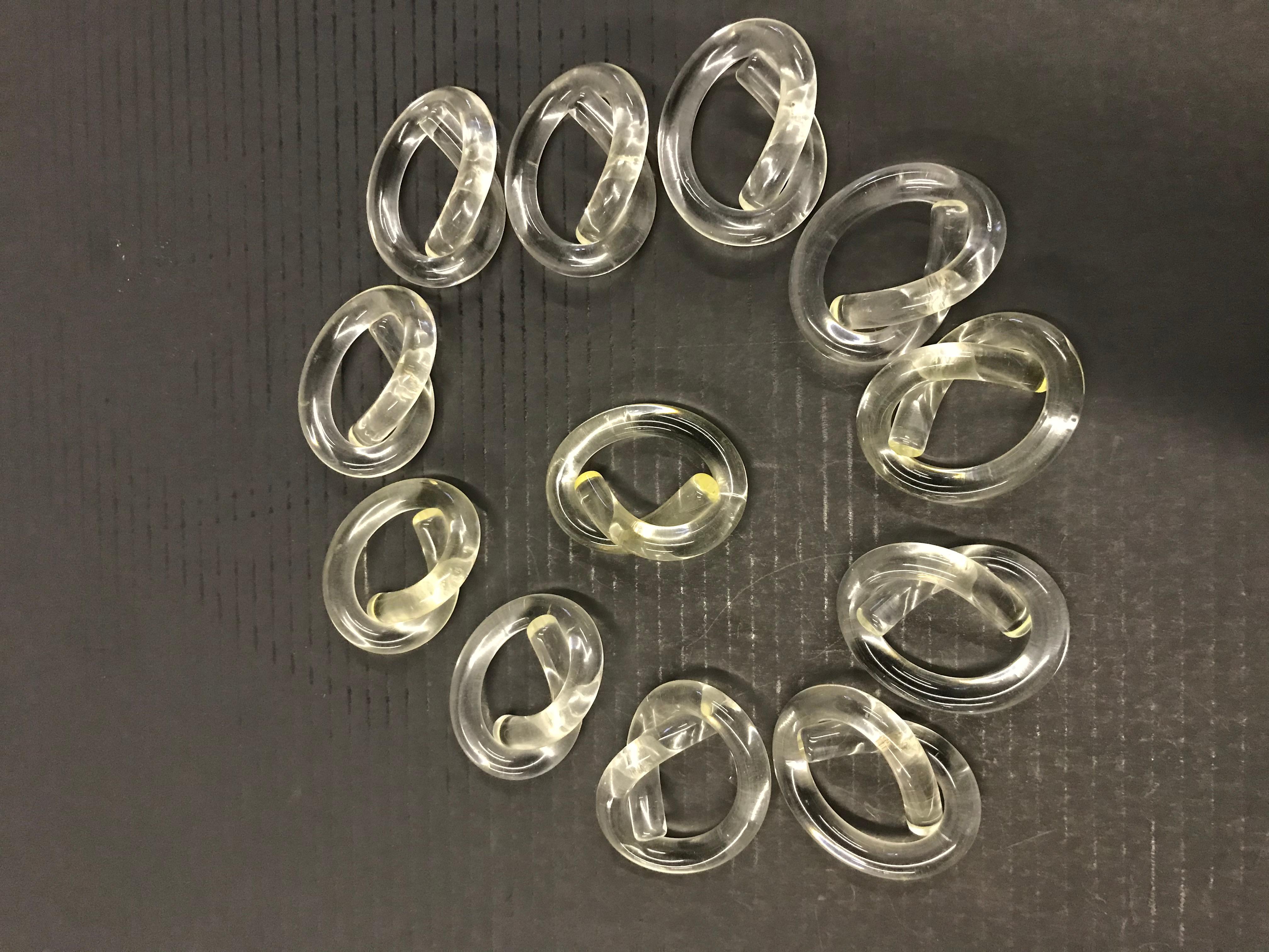 Mid-Century Modern Modern Dorothy Thorpe Set of 12 Lucite Prezels Napkin Rings with Holder, 1960s