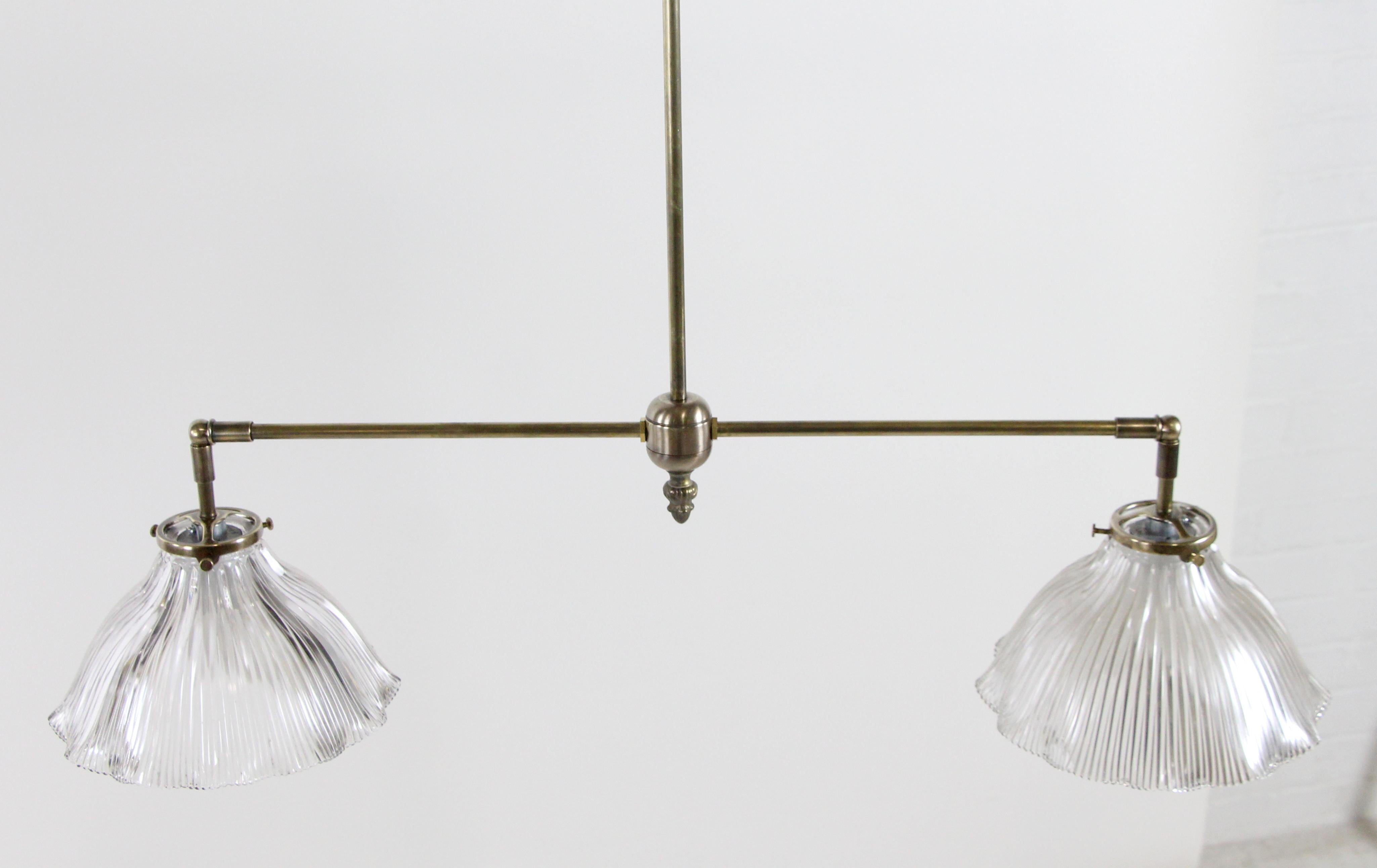 New modern brass double pendant light fixture with original antique clear ruffled prism glass Holophane shades with pinstripe detail. Price includes restoration. Please allow 1-2 weeks to process.