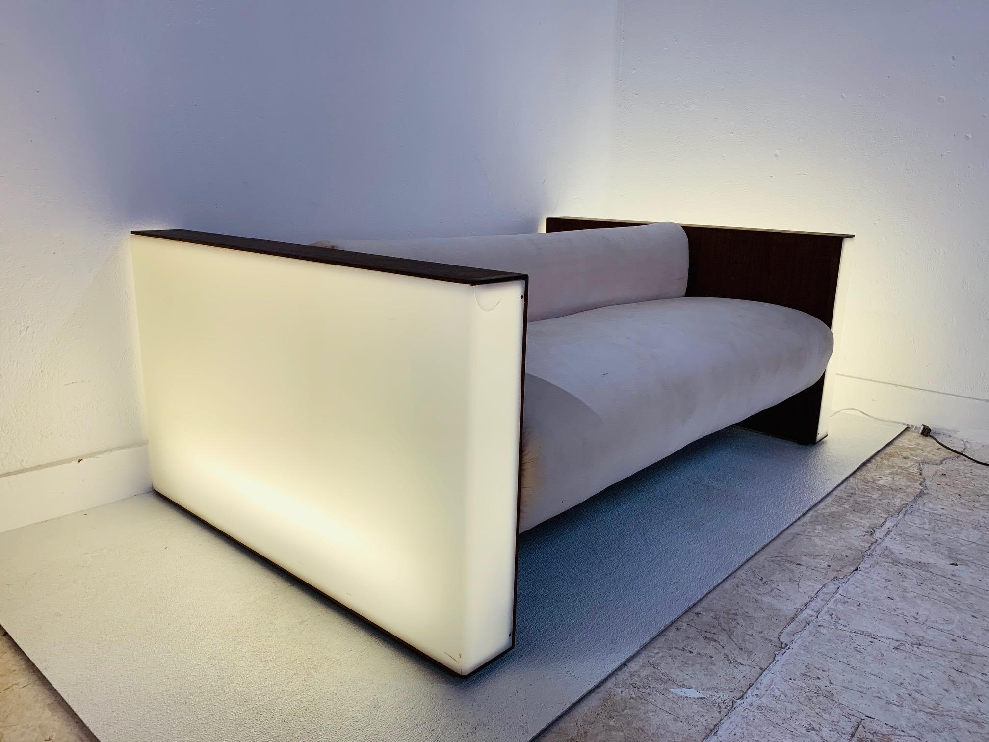 Vladimir Kagan Illuminated Double Sided Sofa. Has a walnut and acrylic frame and the original upholstery. The sides also illuminates.