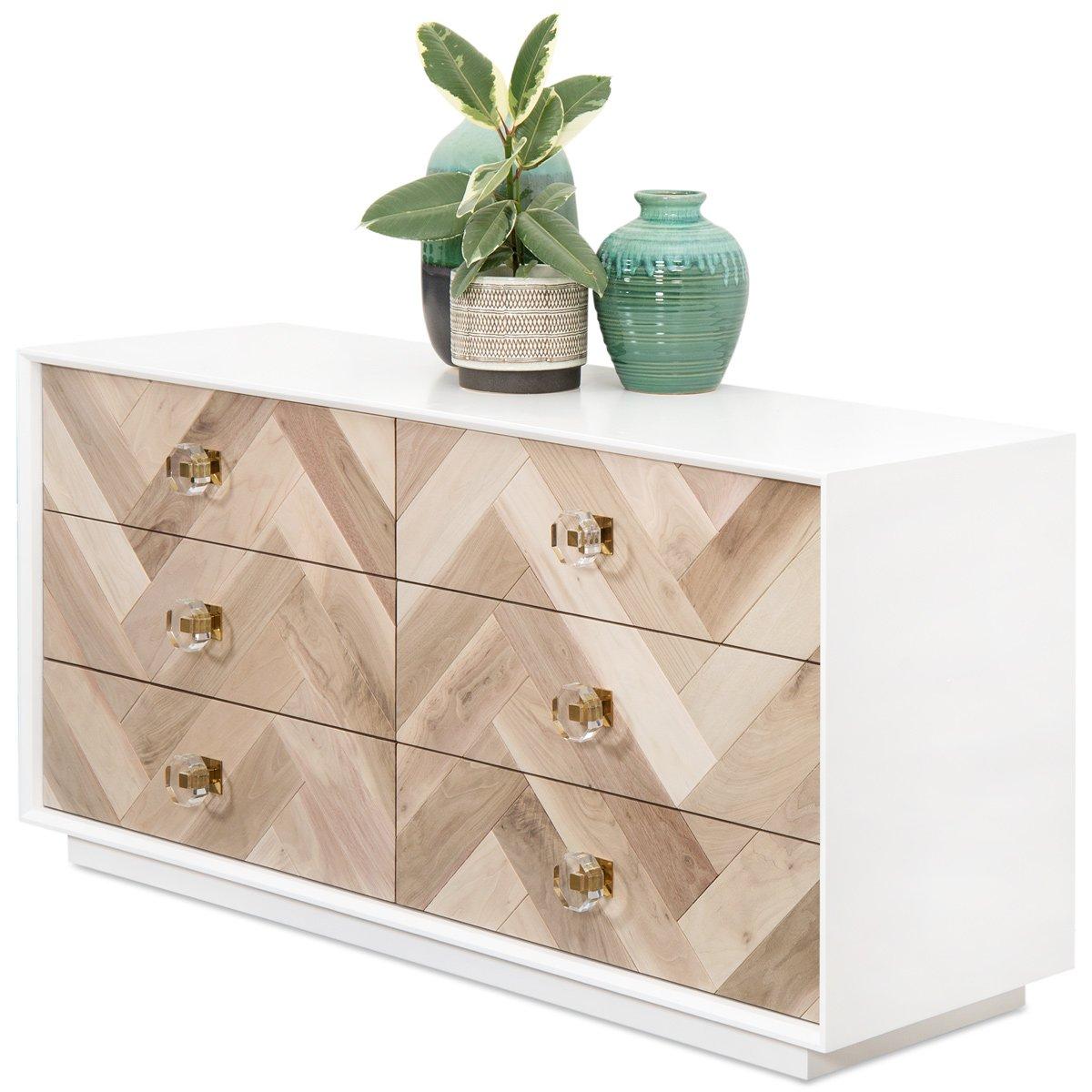 Our stylish new dresser creates a solution to your storage needs. A satin white lacquer box with our beautiful brass and Lucite knobs creates the perfect mix of style and elegance on the six bleached walnut drawer faces. 

Dimensions:
60