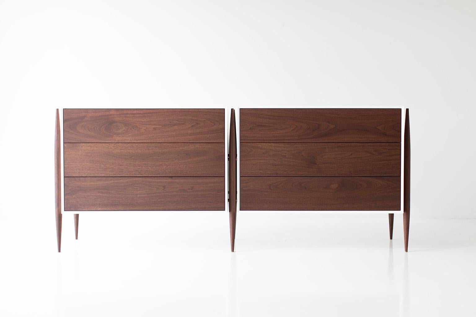 Modern walnut dresser - 2004 - Craft Associates Furniture

This modern walnut dresser from the Cambre Collection for Craft Associates Furniture is expertly crafted. The legs and door fronts are constructed by artisans from solid walnut. The frame