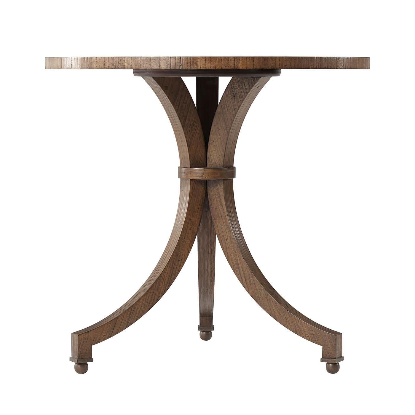 Modern Neo Classic Dutch walnut side table with hewn 'hazel' walnut finish and brass feet. Inspired by an early 19th-century Dutch table, this modern interpretation sits well amongst both modern and traditional decor.
Dimensions: 28