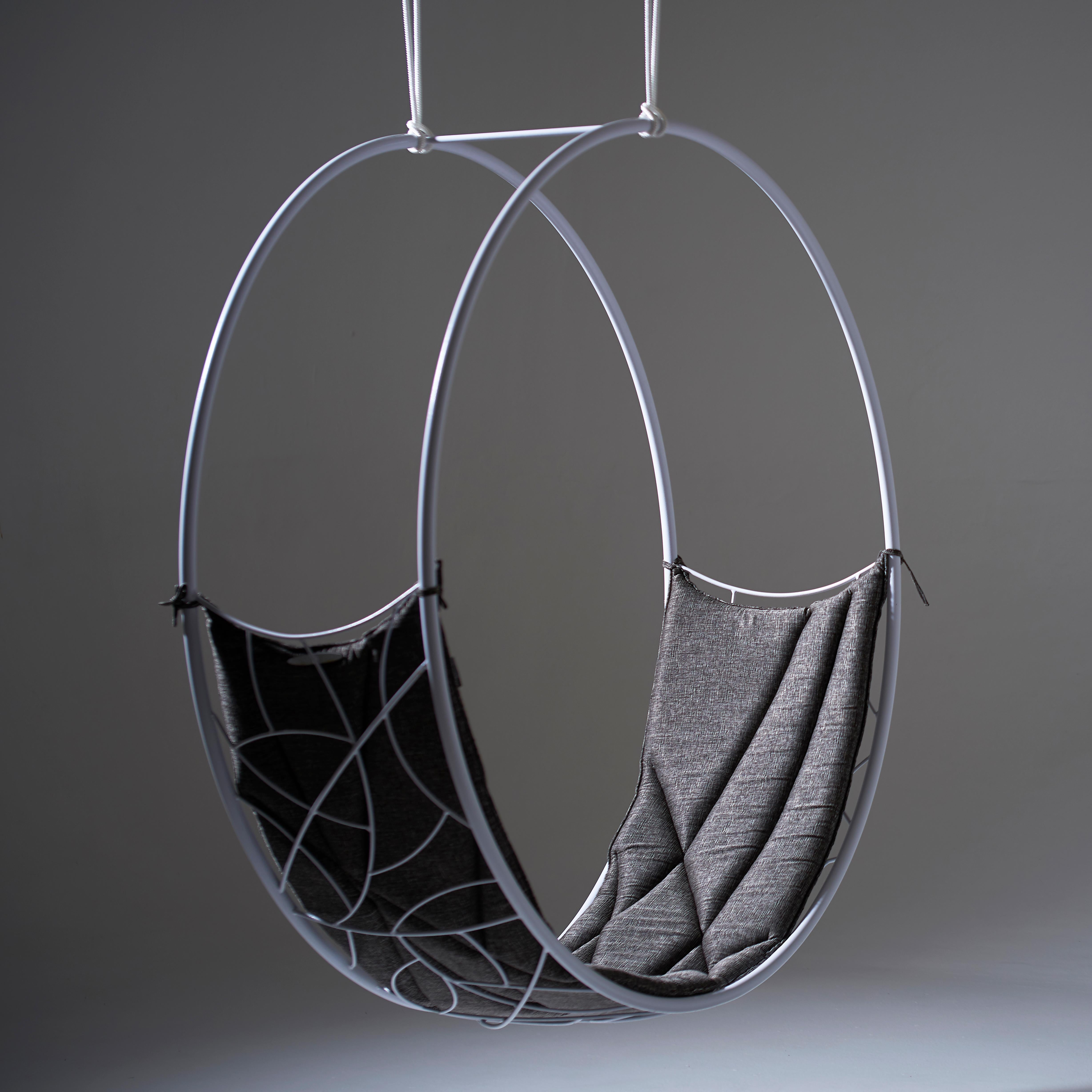 The Wheel hanging chair swing seat is sculptural and dynamic. Its striking circular shape lends itself for use as a functional art piece.

The chair has an open yet enveloping feel. The pattern detail is inspired by nature and reminiscent of the