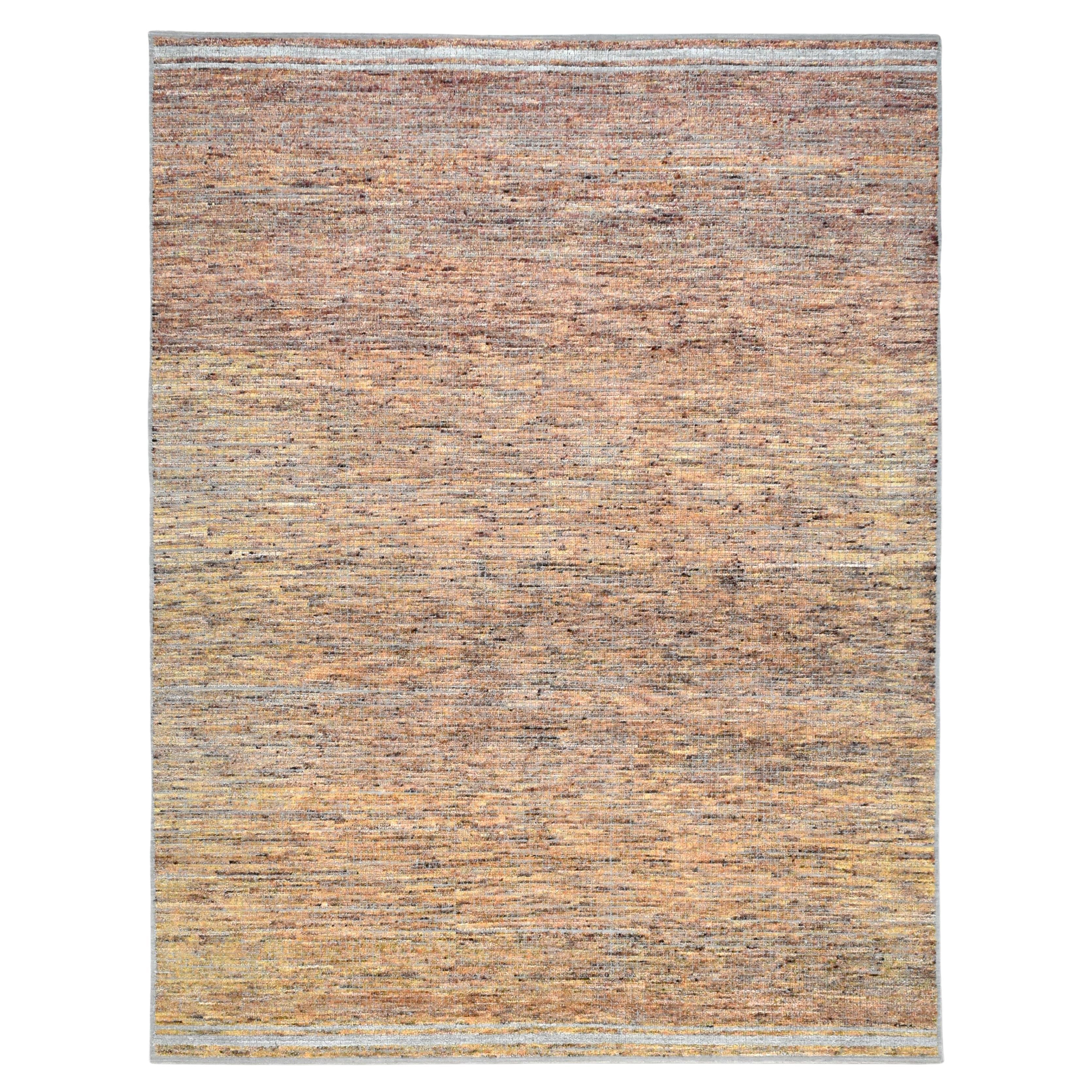 Moderner Wollteppich in Erdtönen 9
2

x11
9

