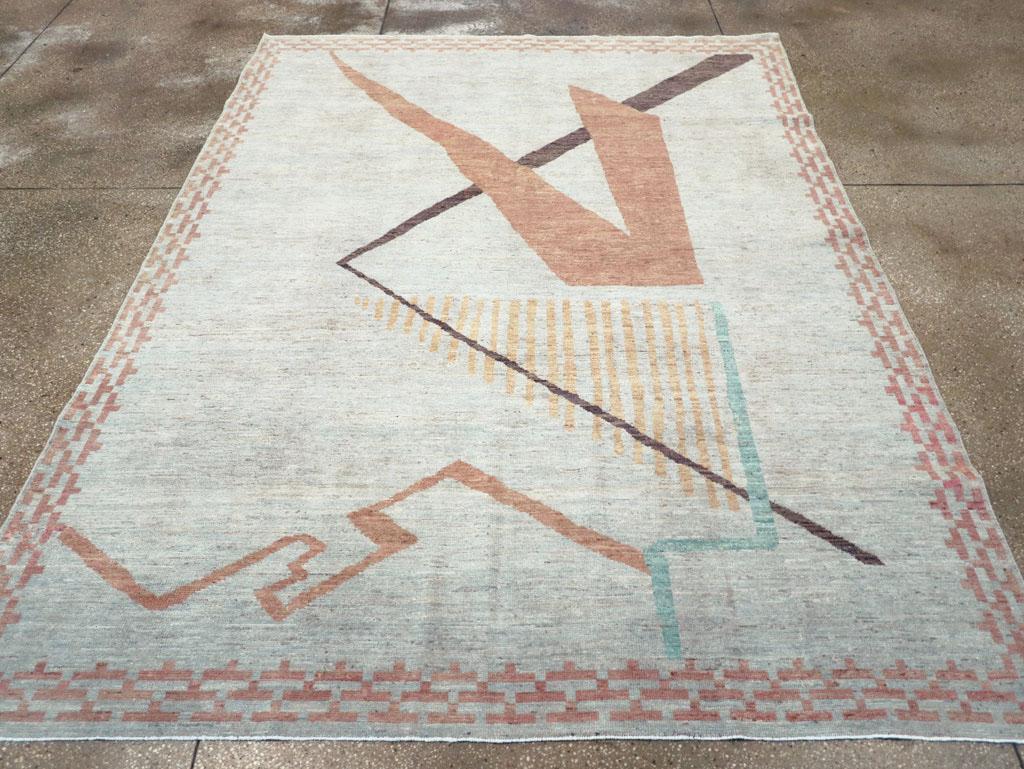 Una moderna alfombra de acento de Khotan, del Turquestán Oriental, hecha a mano durante el siglo XXI.

Medidas: 7' x 9' 3