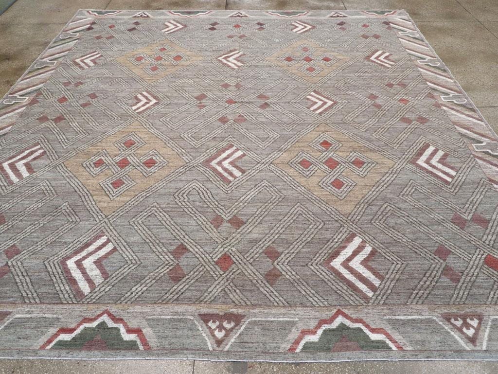 A modern East Turkesan Khotan large square room size carpet handmade during the 21st century.

Measures: 12' 8