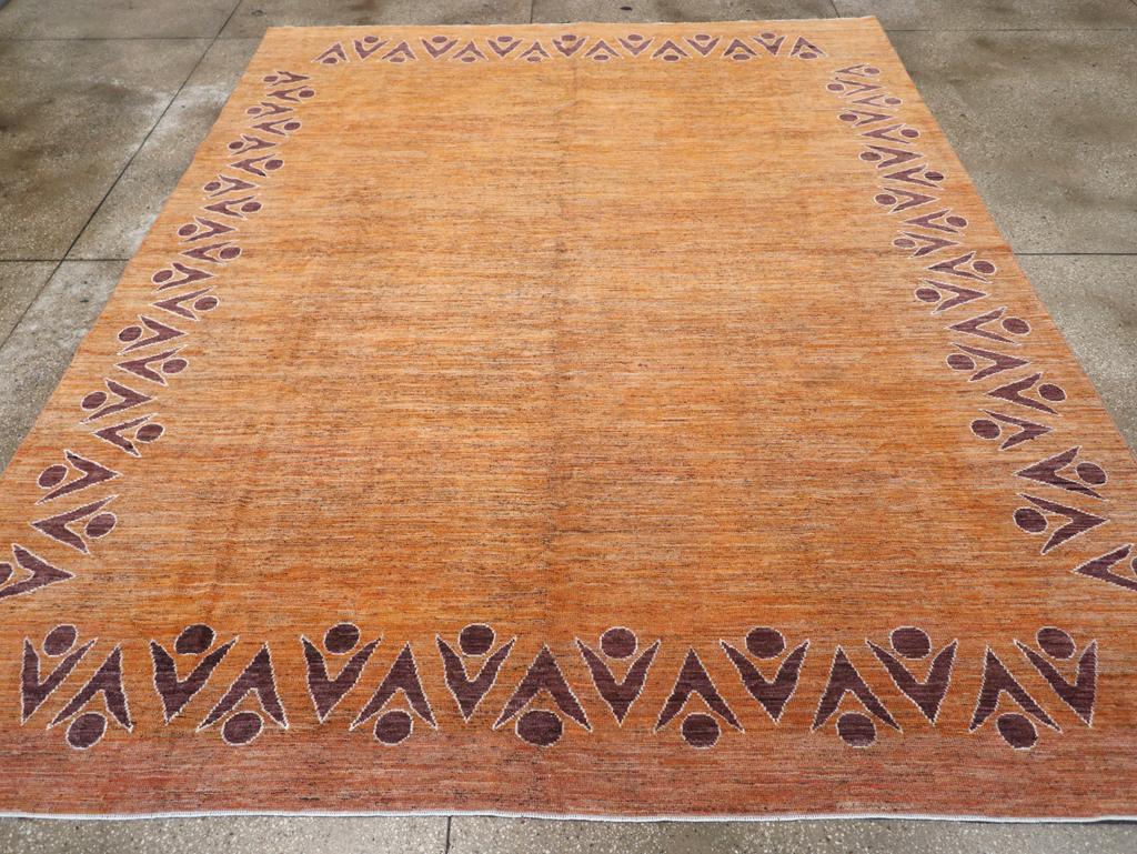 A modern East Turkestan Khotan room size carpet handmade during the 21st century.

Measures: 9' 3