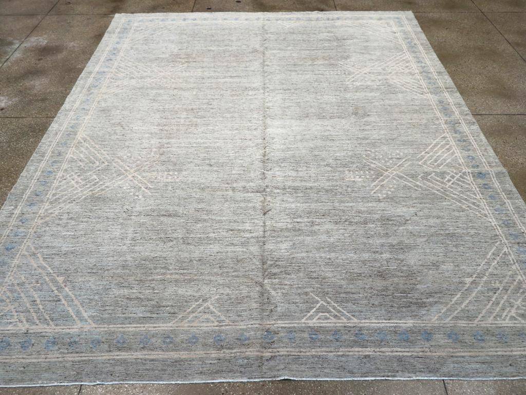 A modern East Turkestan Khotan room size carpet handmade during the 21st century.

Measures: 9' 6