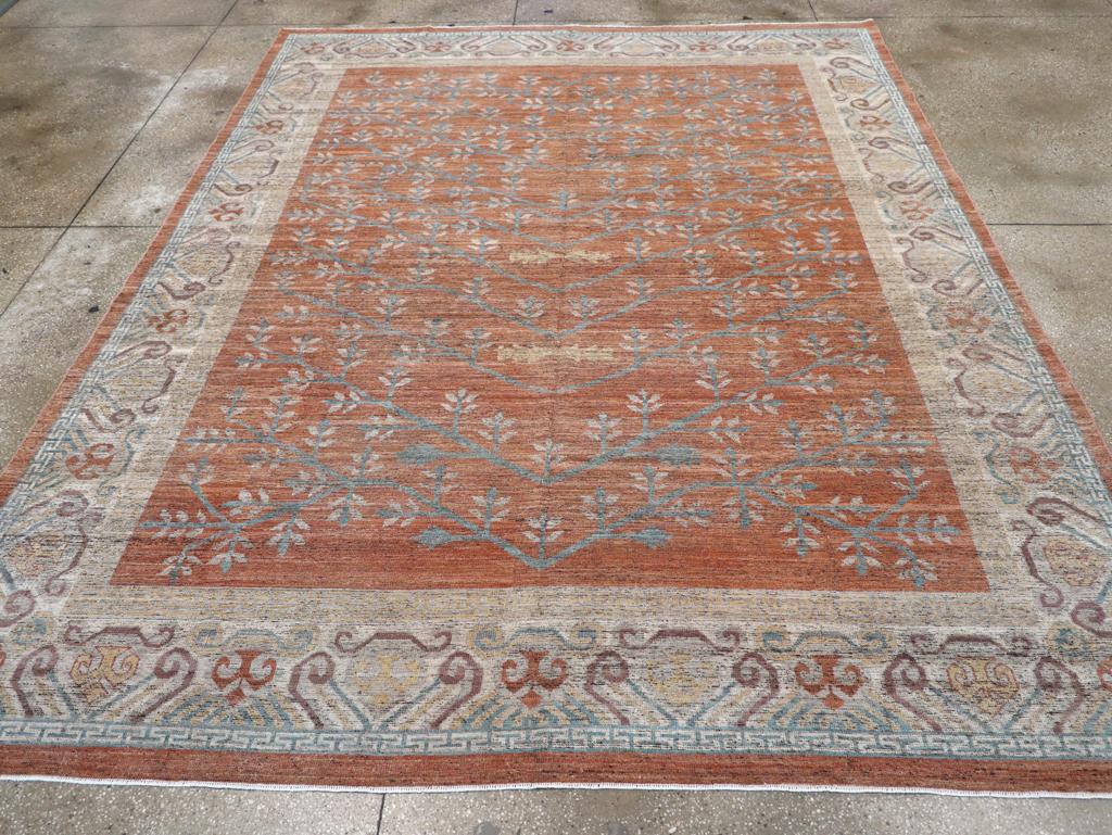 A modern East Turkestan Khotan room size carpet handmade during the 21st century.

Measures: 9' 2