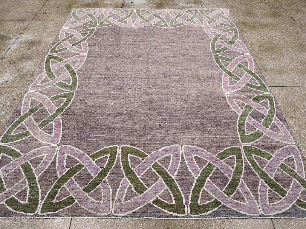 This 21st-century East Turkestan Khotan rug, measuring 9' 1