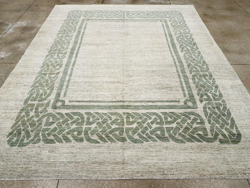 This 21st-century East Turkestan Khotan rug, measuring 9' 2