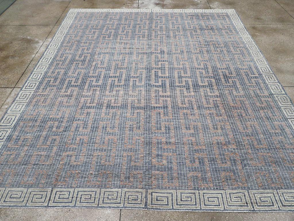 This 21st-century East Turkestan Khotan rug, measuring 10' 7