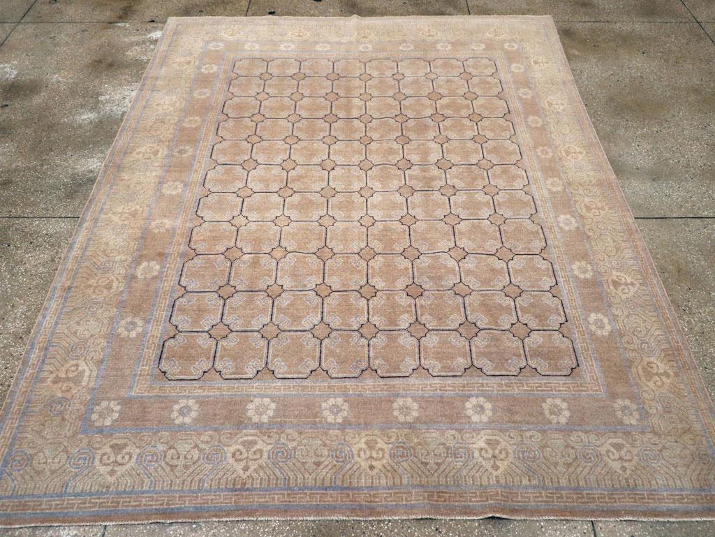 This 21st-century East Turkestan Khotan rug, measuring 8'0