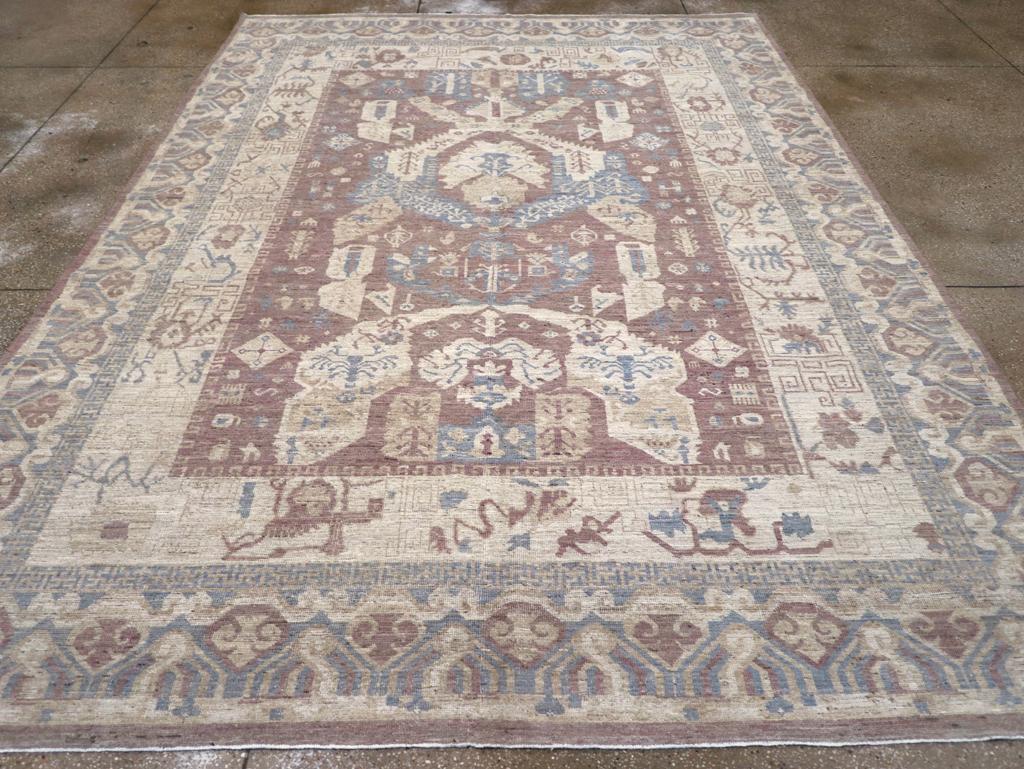 This exquisite 21st-century East Turkestan Khotan rug, measuring 9' 1