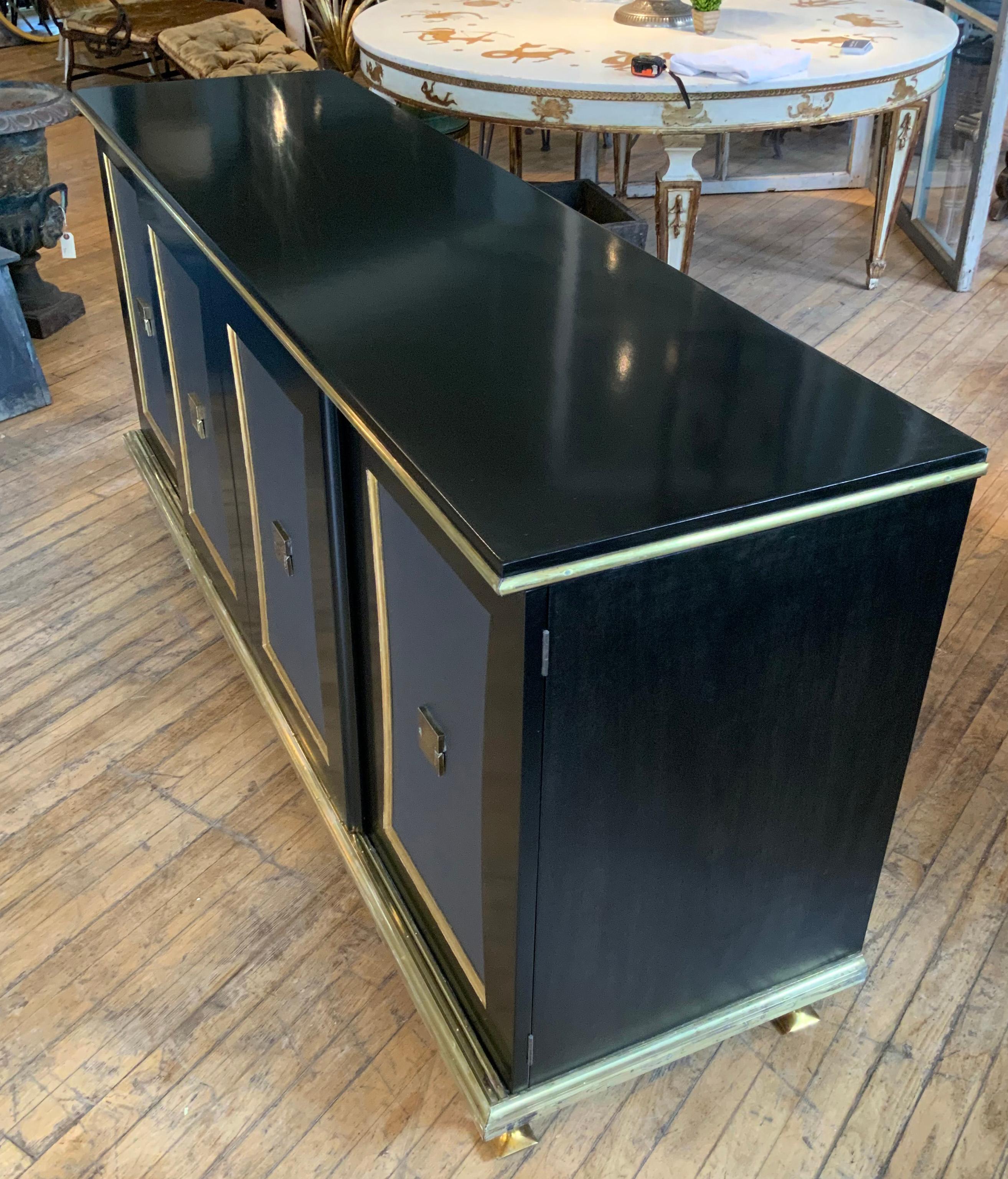 Mid-20th Century Modern Ebonized Cabinet with Leather and Brass by Renzo Rutili