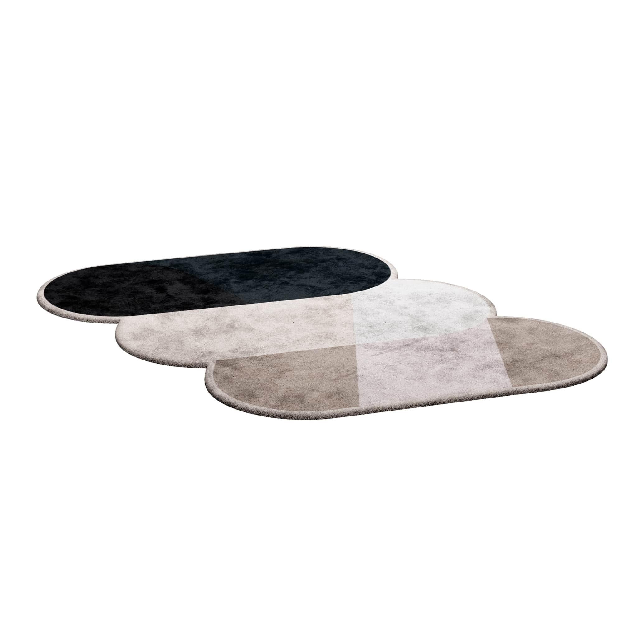 TAPIS Shaped #002 is an eclectic rug that brings back mid-century modern vibes mixed with Postmodern style. This rug is handmade using the hand-tufted technique from 100% botanical silk with a thickness of 16mm. Available in sizes Small and Large.