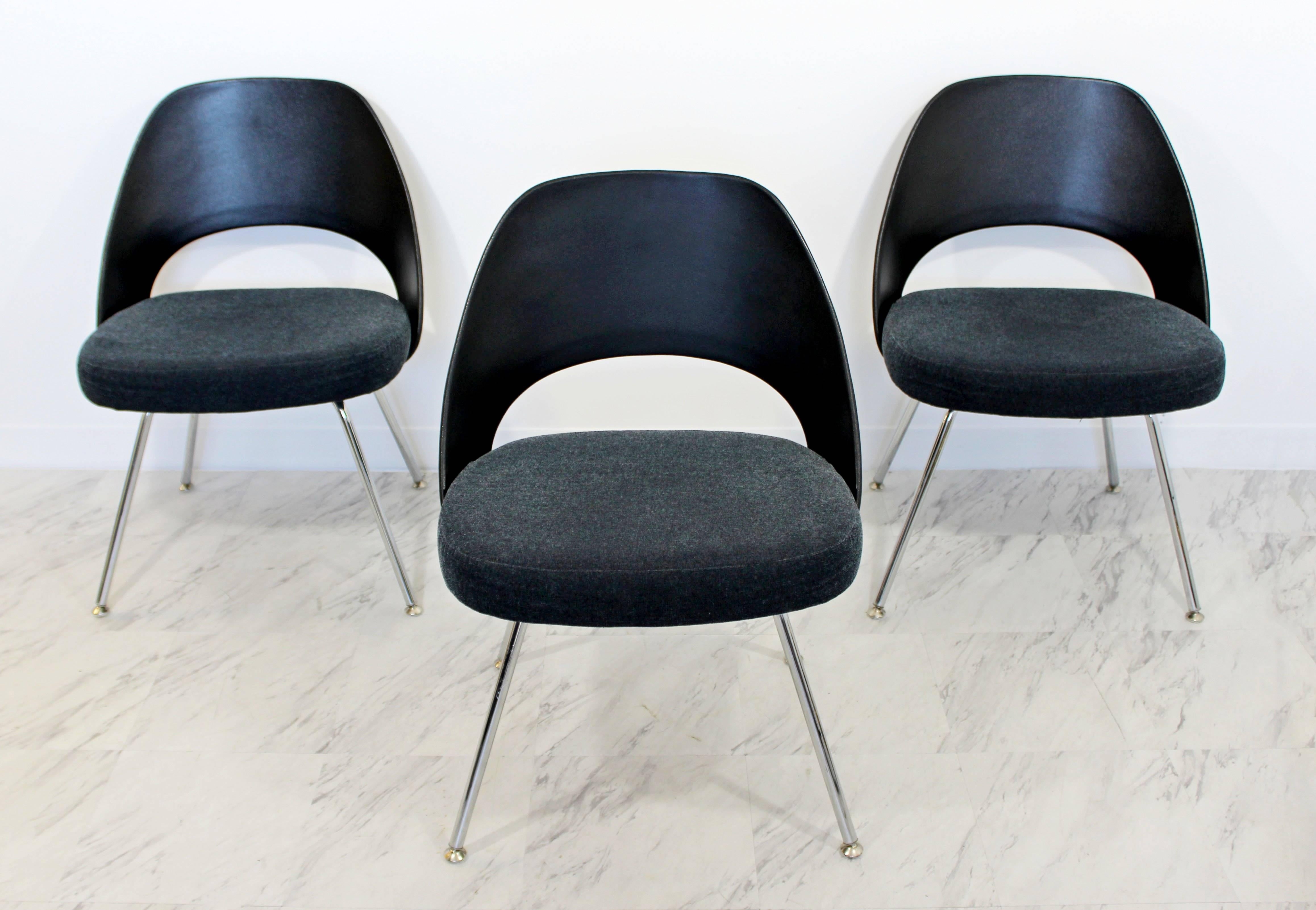 For your consideration is a gorgeous set of three office chairs, designed by Eero Saarinen for Knoll, circa the 1960s. These are reproduced in 2011. In excellent condition. The dimensions are 21