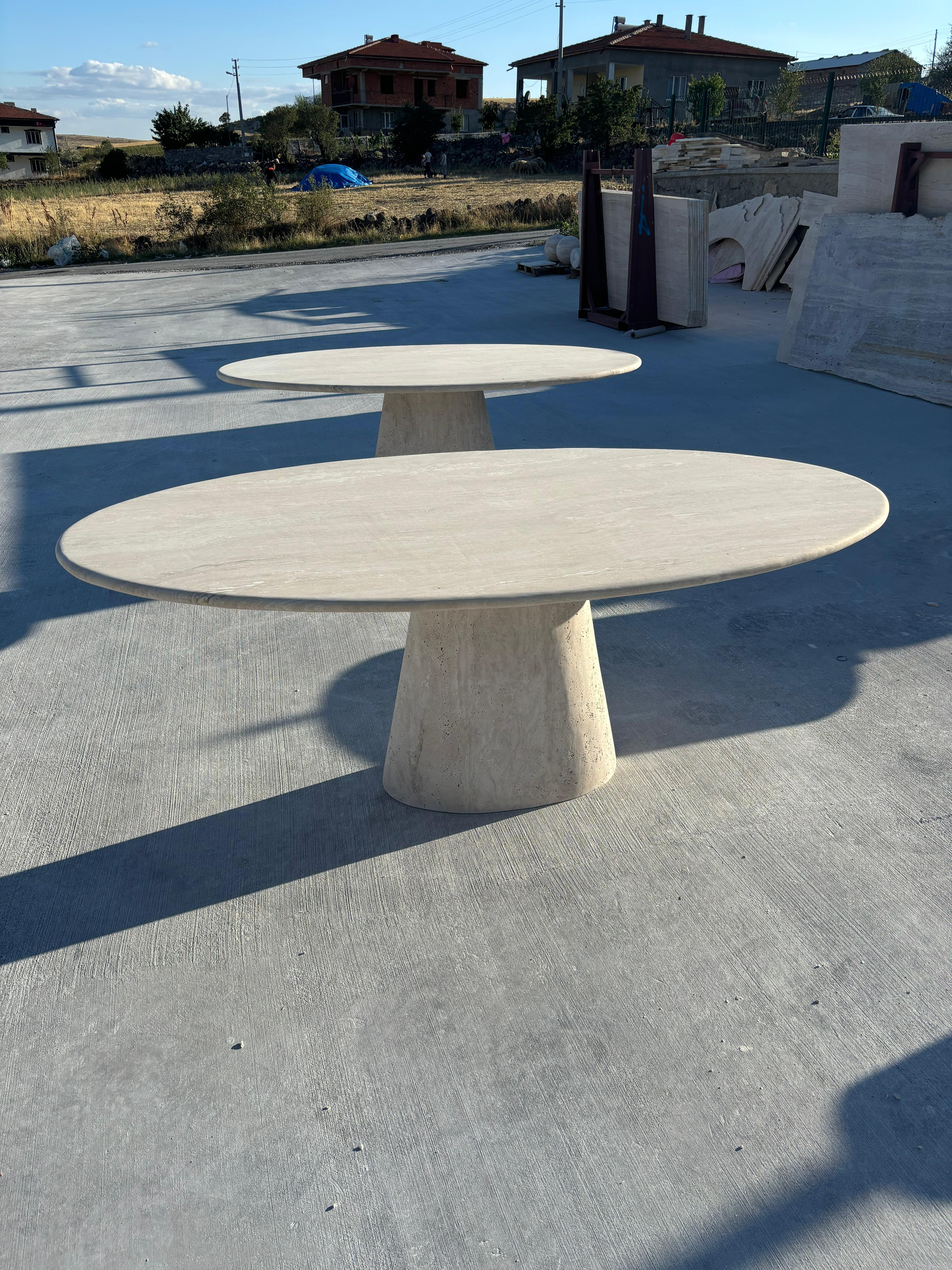 ELLIPS TRAVERTINE MARBLE DINING TABLE

Type of Marble: Travertine
Dimensions: 70