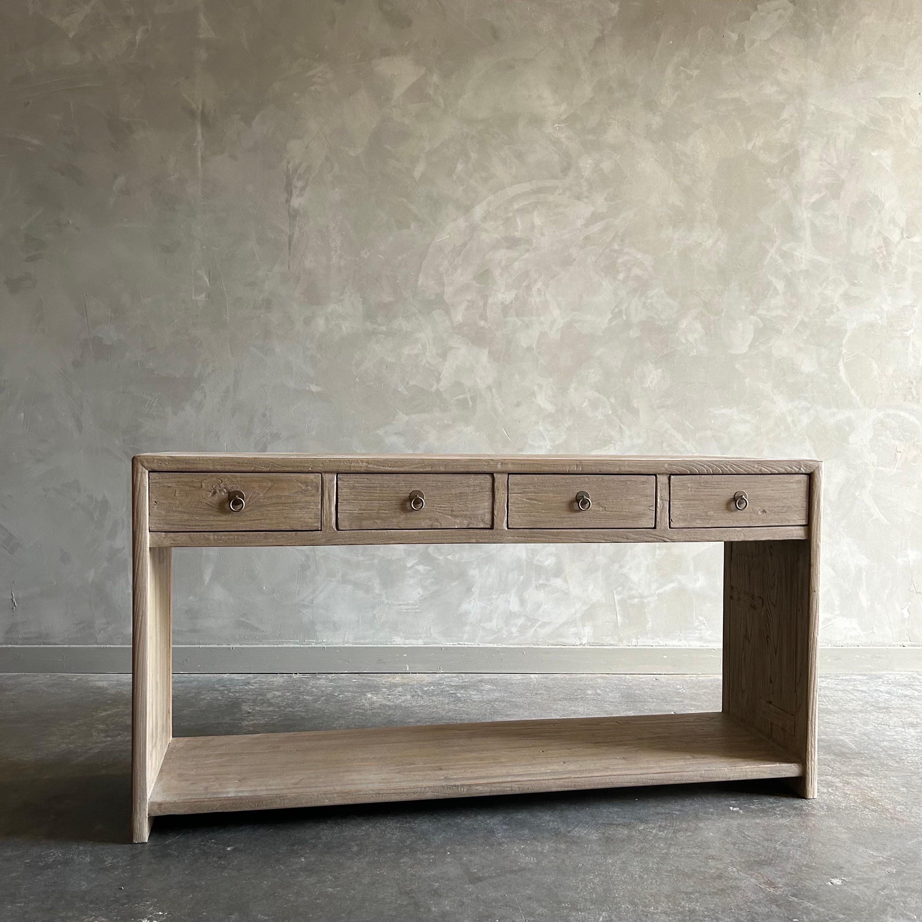 IVAN NATURAL CONSOLE TABLE
Natural reclaimed elm wood that is beautifully crafted and serves as the perfect storage solution for any space. Since this is made from vintage reclaimed materials, there may be some imperfections in the piece or grain of