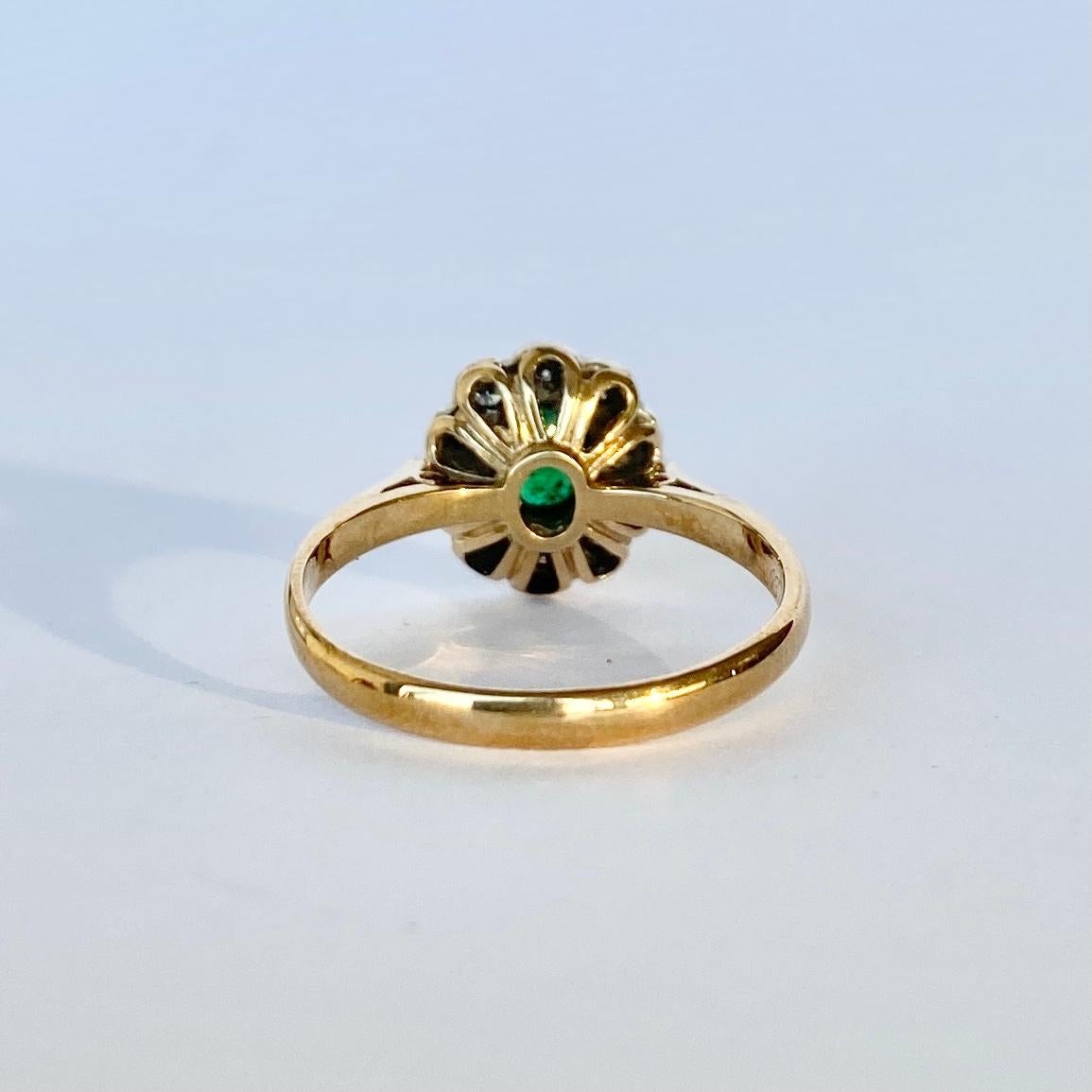Cluster rings are so wearable and timeless. This particular cluster holds a deep gorgeous emerald at the centre and is encircled within a fabulous halo of diamonds. The emerald measures 30pts and the diamonds total 20pts. The stones are set in