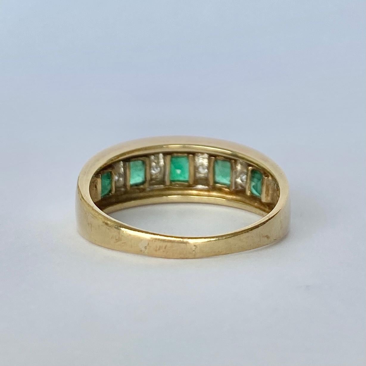 The square cut emeralds in this ring are beautiful and bright and measure 15pts each. In between the gorgeous green stones are diamonds which measure 2pts each. The ring is modelled in 9carat gold.

Ring Size: S 1/2 or 9 1/4 
Band Width: