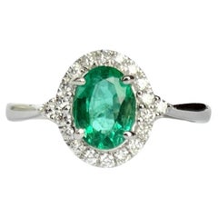Modern Emerald and Diamond Platinum Cluster Ring