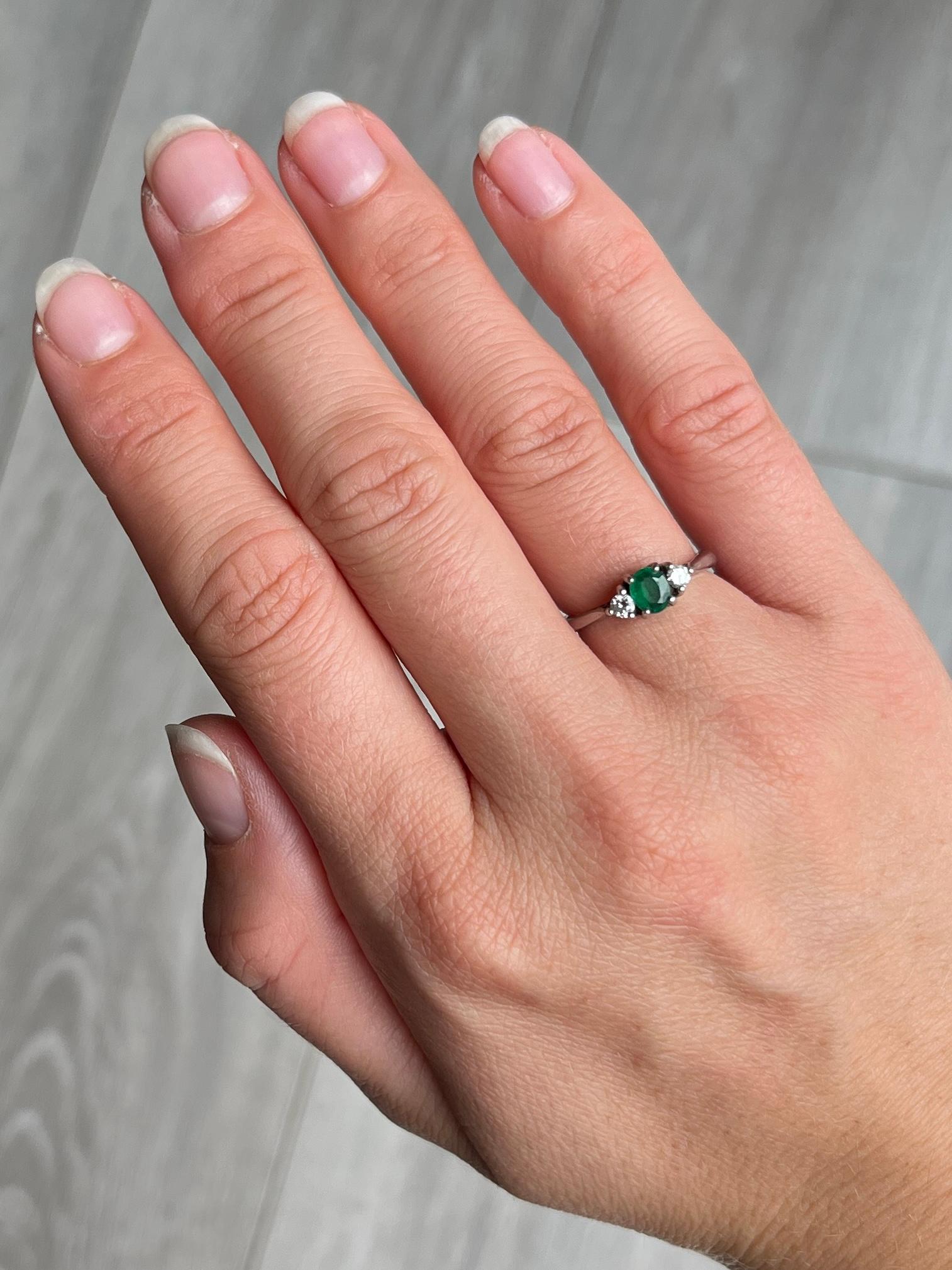 Round Cut Modern Emerald and Diamond Platinum Three-Stone Ring For Sale