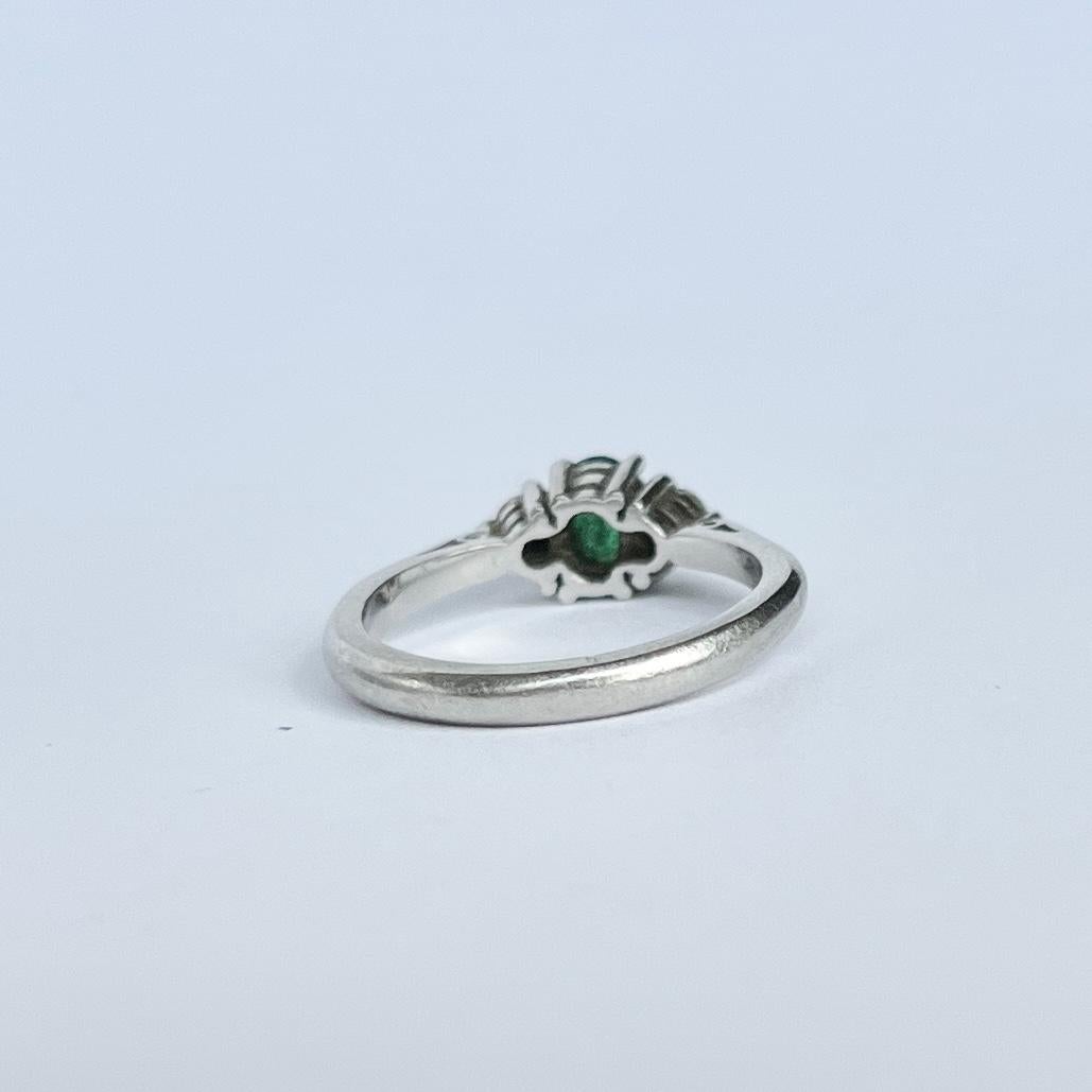 Modern Emerald and Diamond Platinum Three-Stone Ring In Good Condition For Sale In Chipping Campden, GB