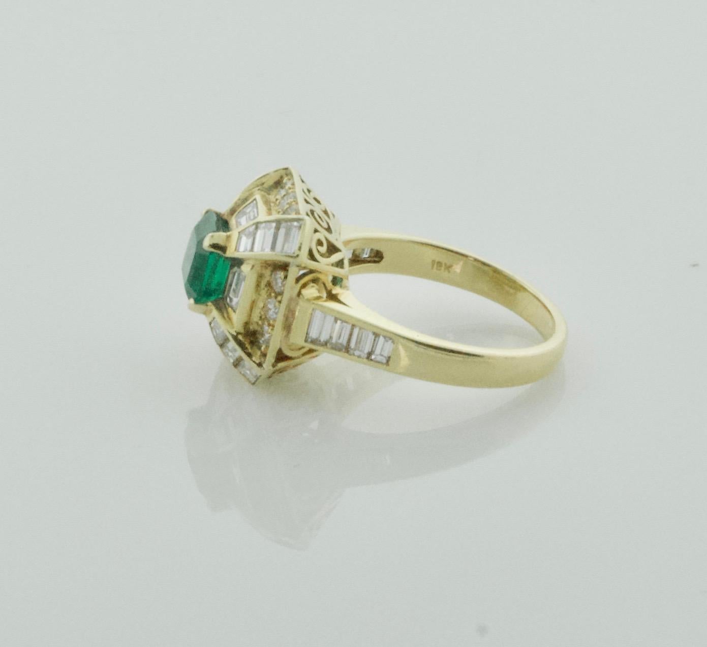 Women's or Men's Modern Emerald and Diamond Ring by Terrell and Zimmelman in 18 Karat For Sale